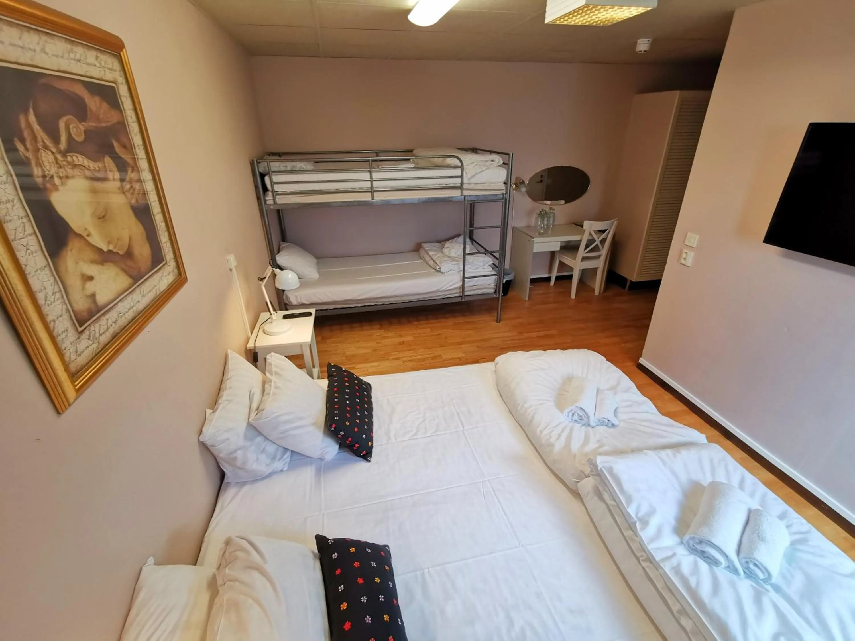 Bed in Green Door Hotel