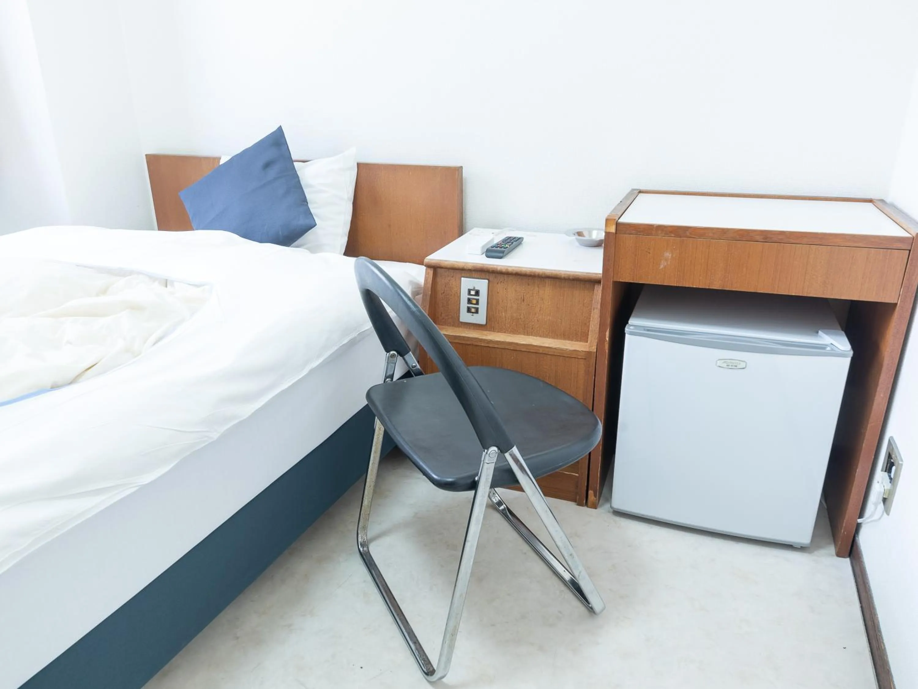 Bed in Tabist Business Hotel Kanazono Gifu