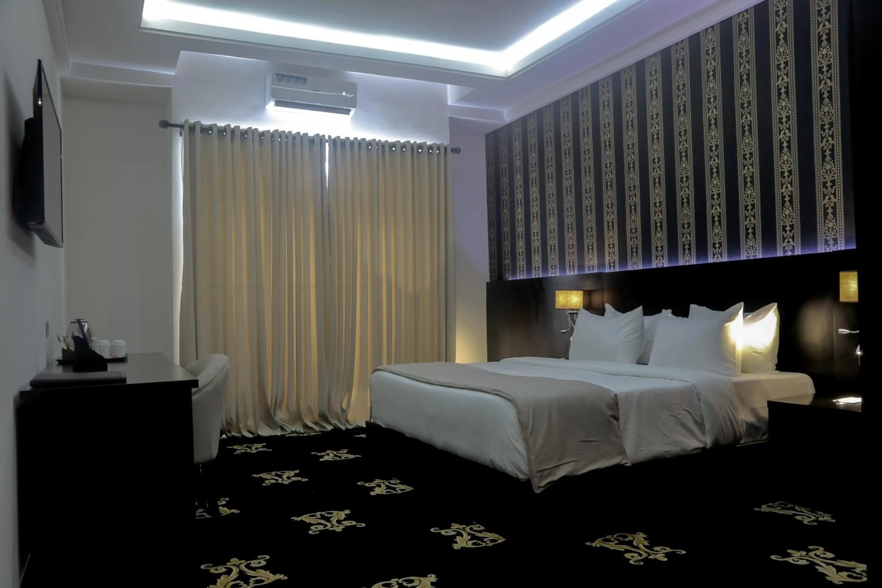 Photo of the whole room, Bed in BON Hotel Ikeja Residence