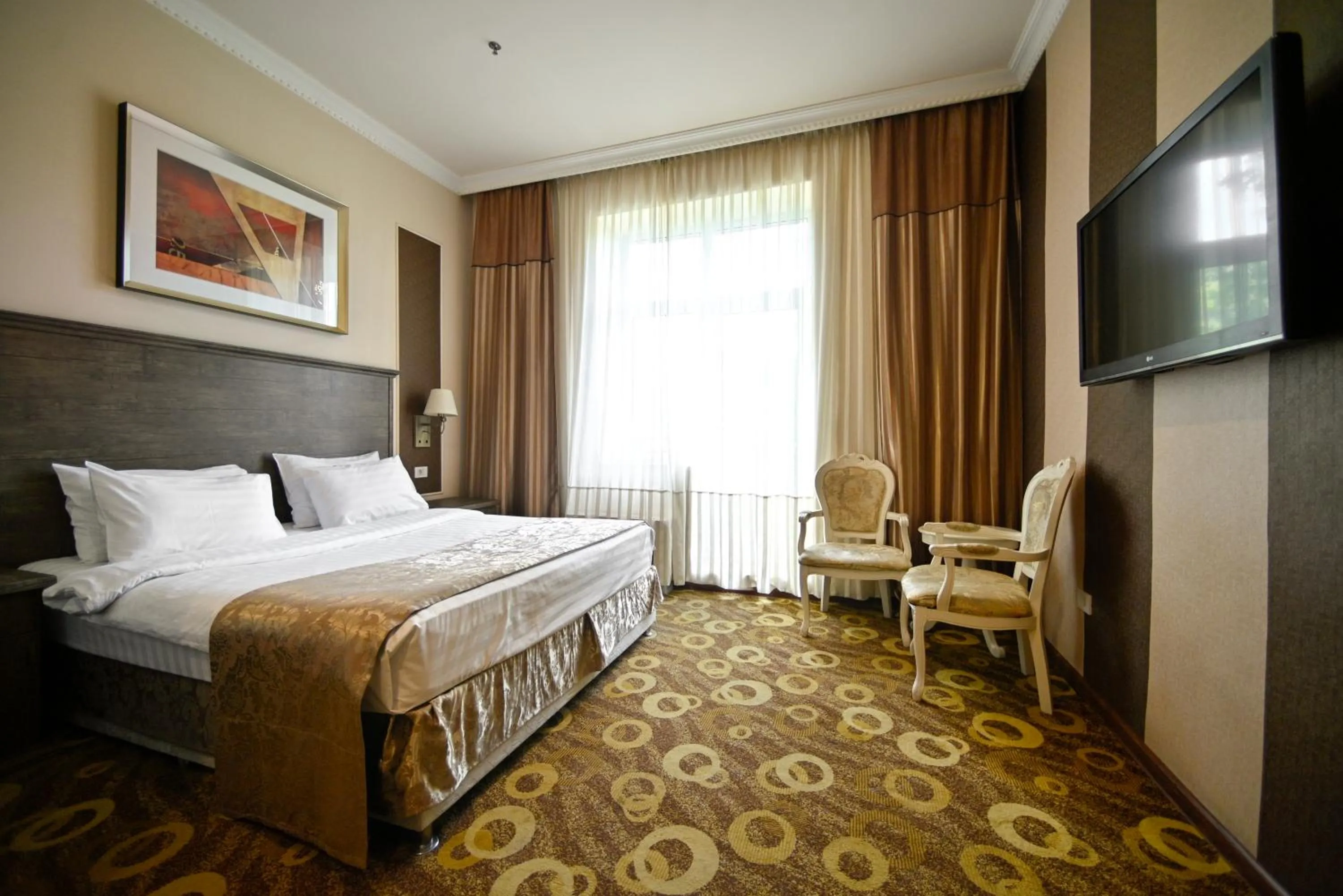 Bed in Imperial Palace Hotel Yerevan