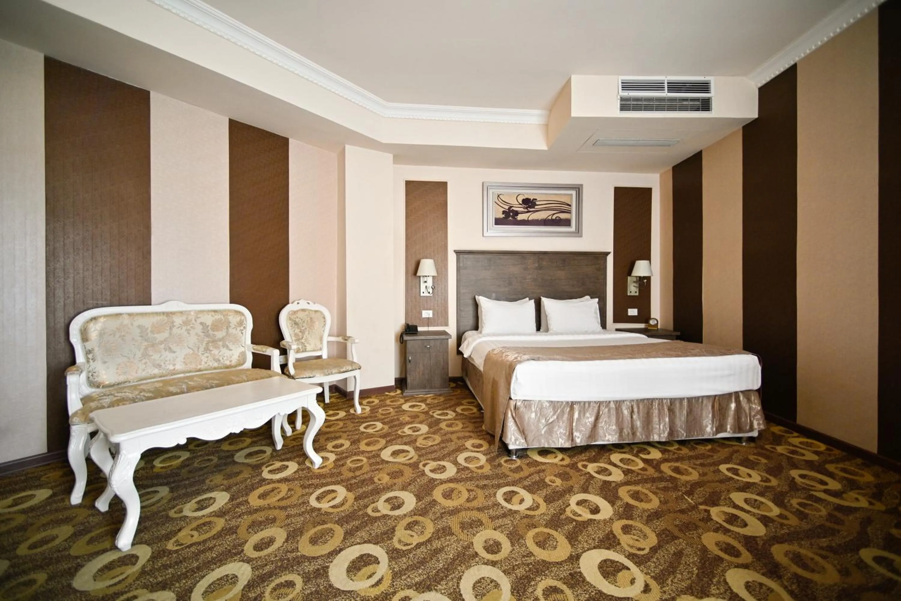 Bed in Imperial Palace Hotel Yerevan