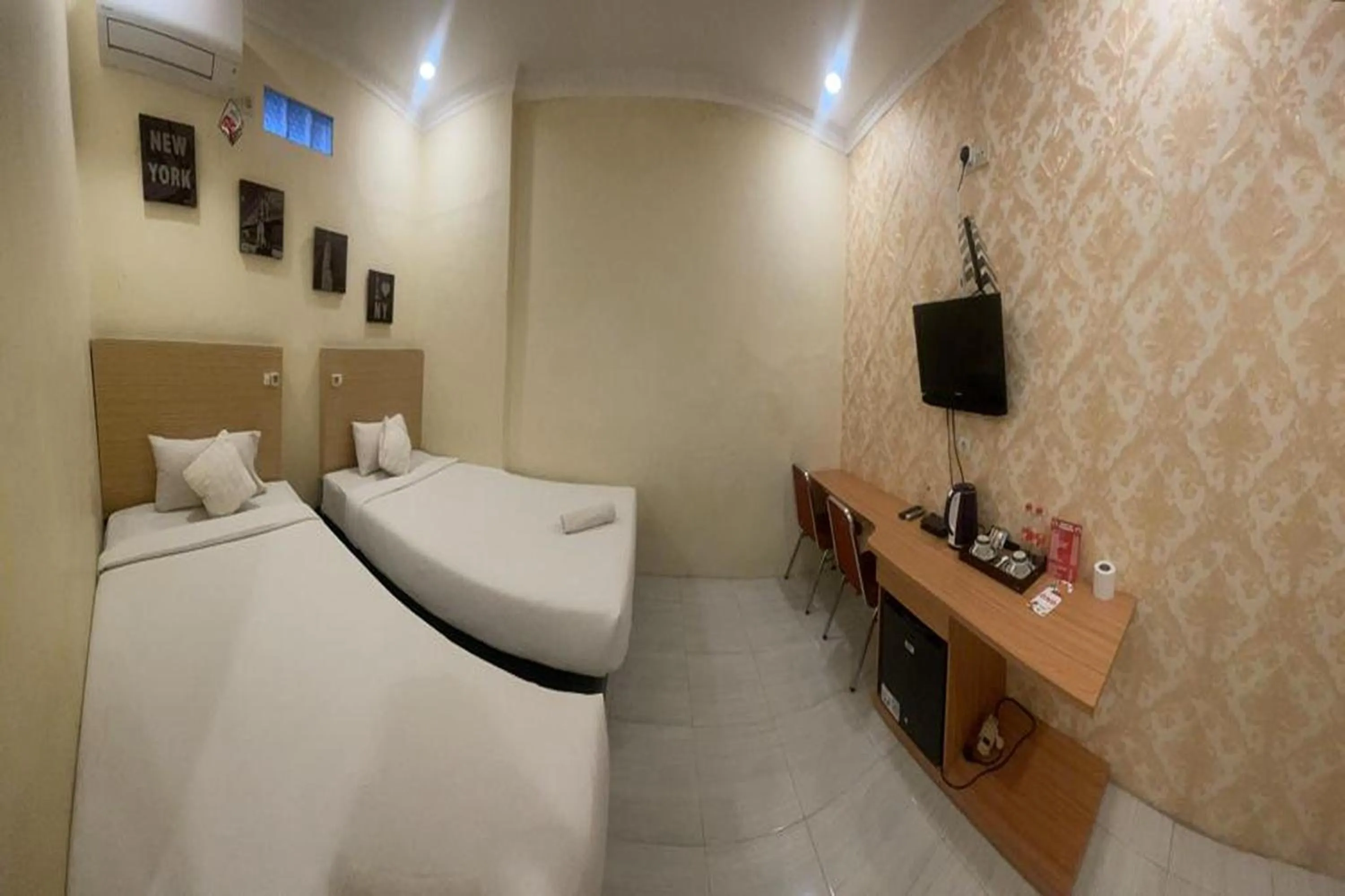 Bed in Perdana Kasih Hotel Klaten