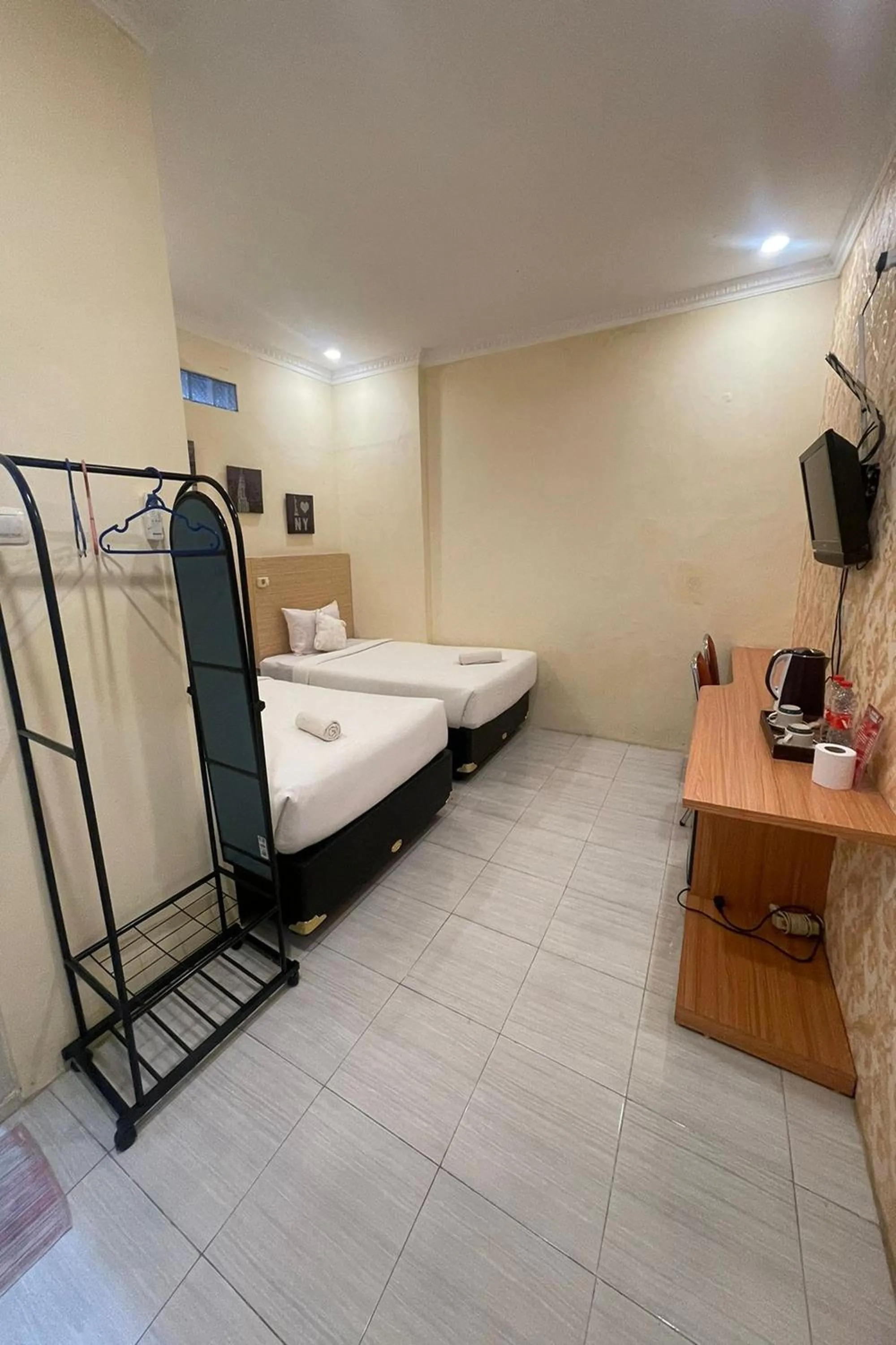 Bed in Perdana Kasih Hotel Klaten