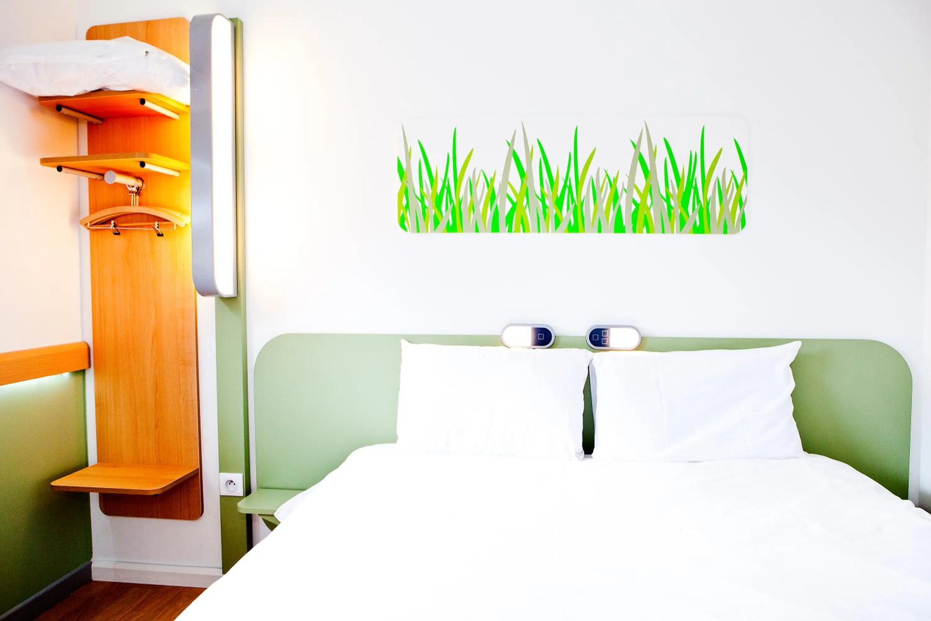 Bed in Ibis Budget Sarrebourg Buhl