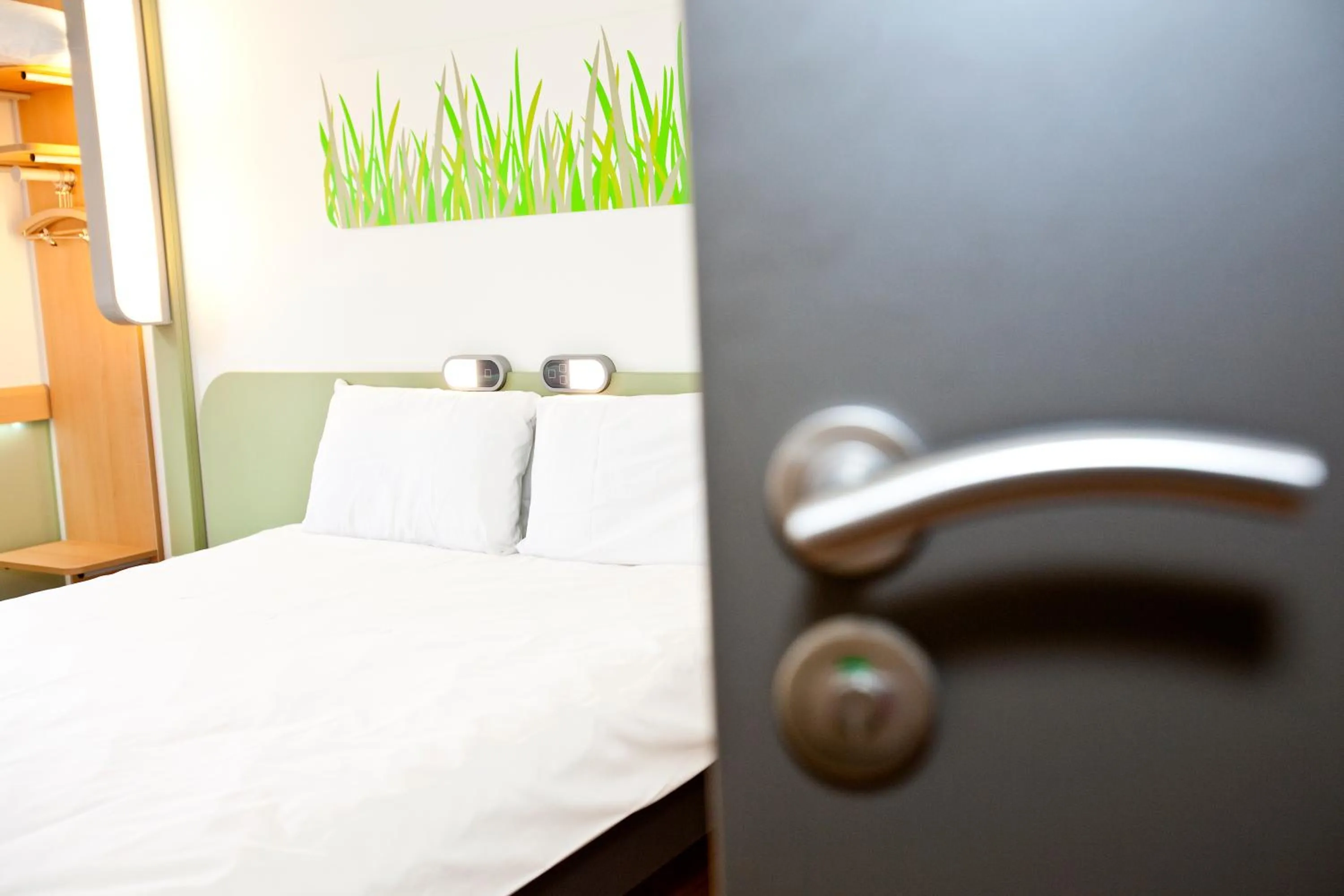 Bed in Ibis Budget Sarrebourg Buhl