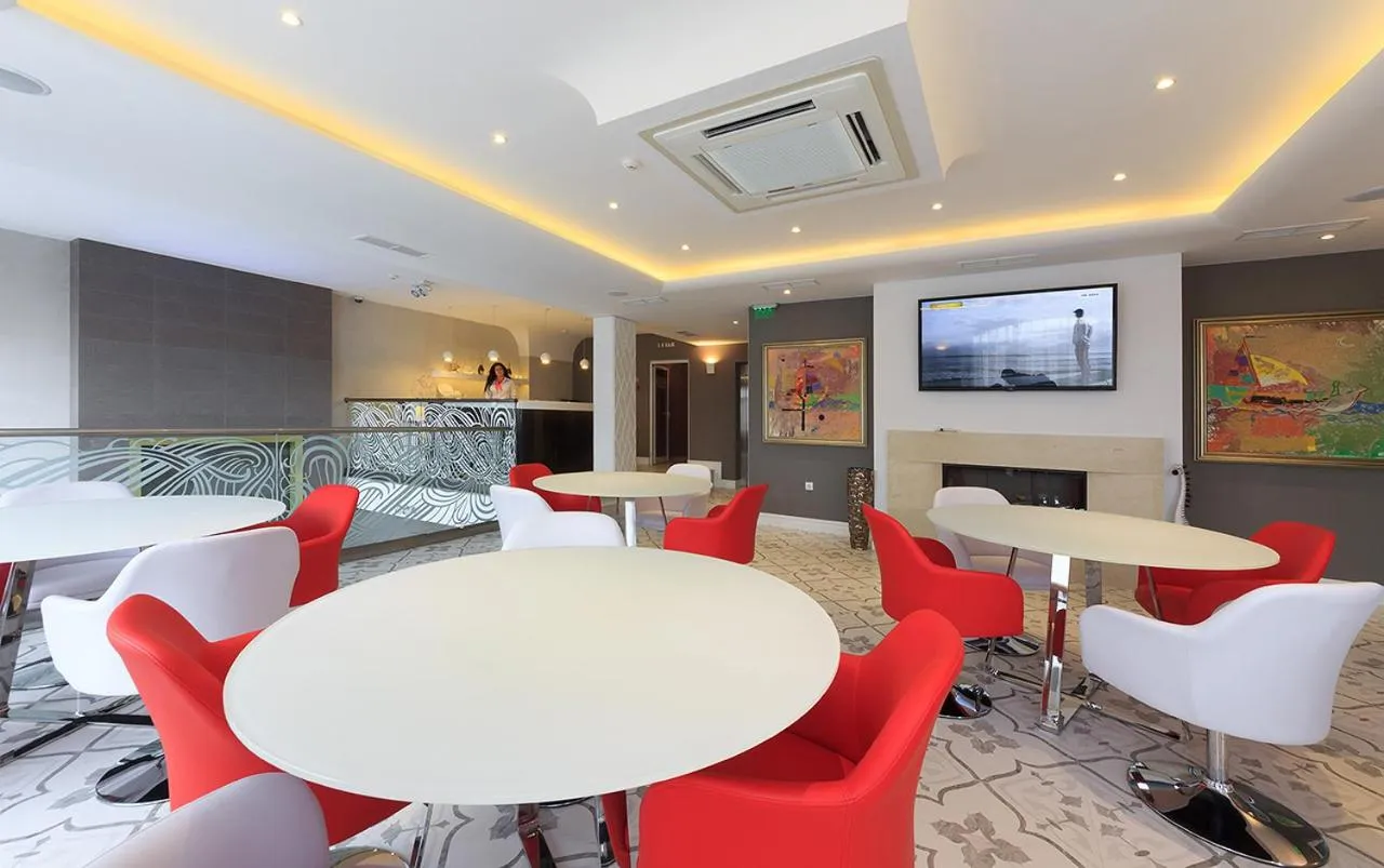 Lobby or reception in Agusta Hotel, Garden & SPA