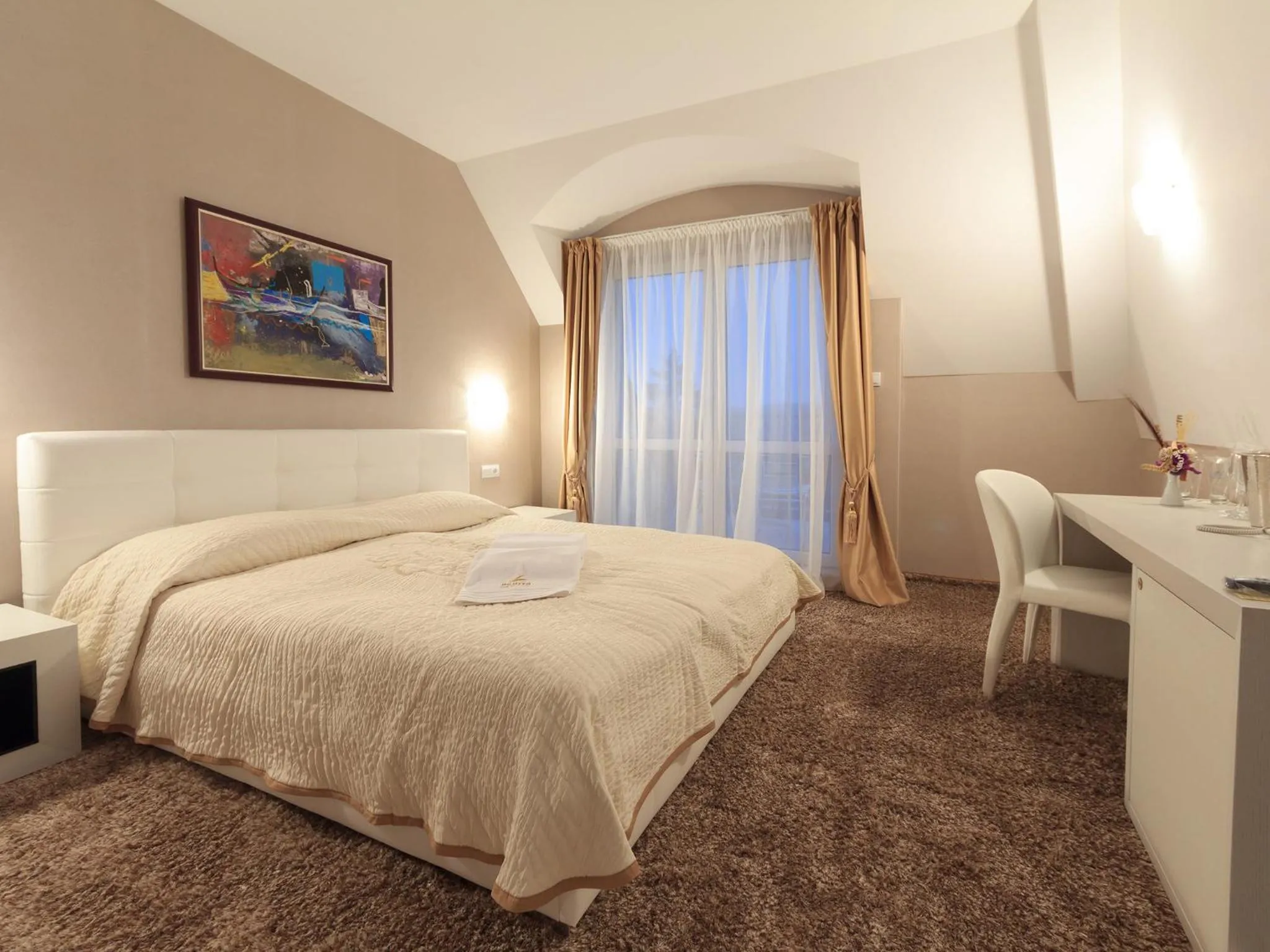 Bed in Agusta Hotel, Garden & SPA