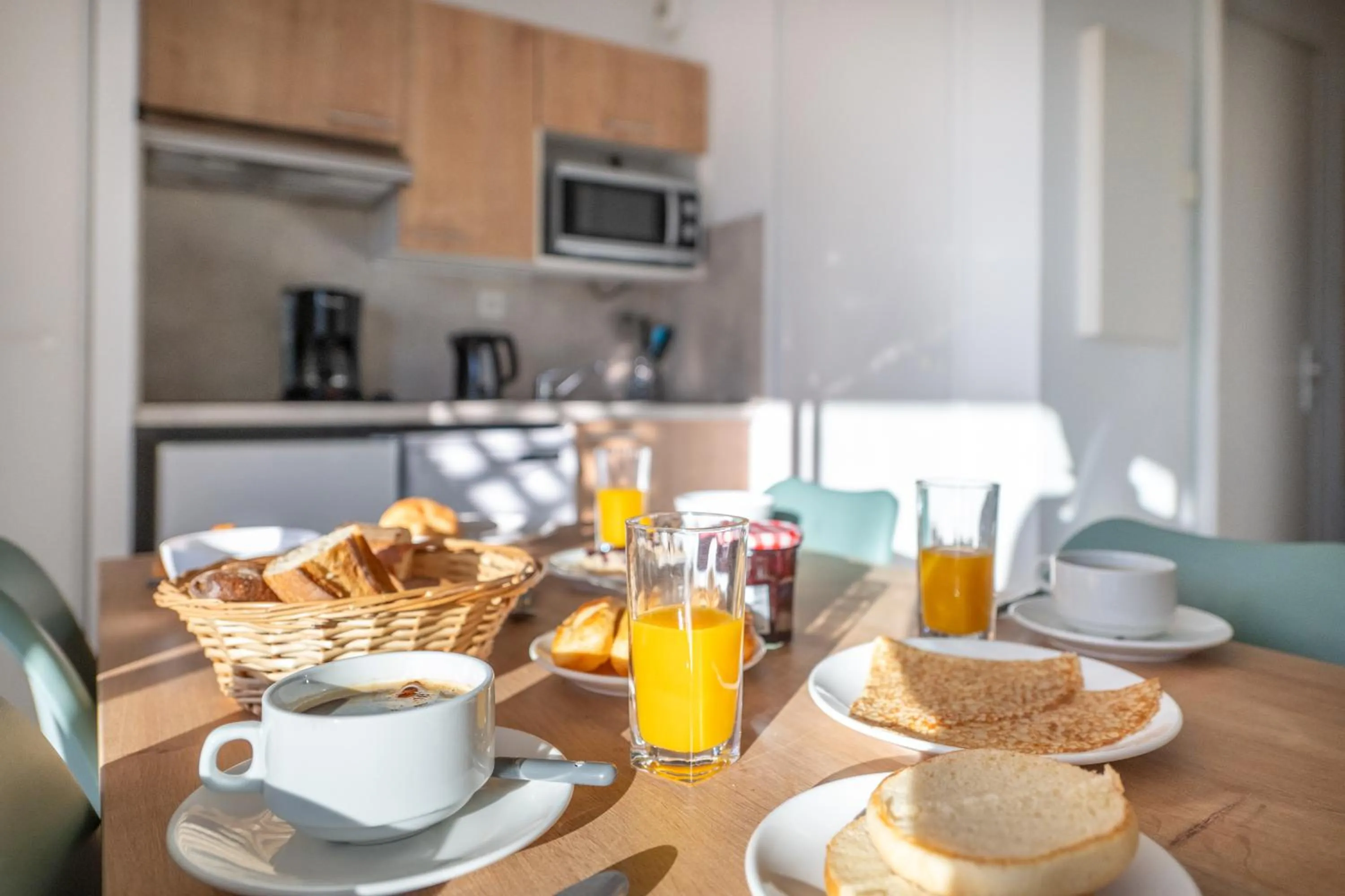 Kitchen or kitchenette in Résidence Odalys Les Terrasses de Fort Boyard