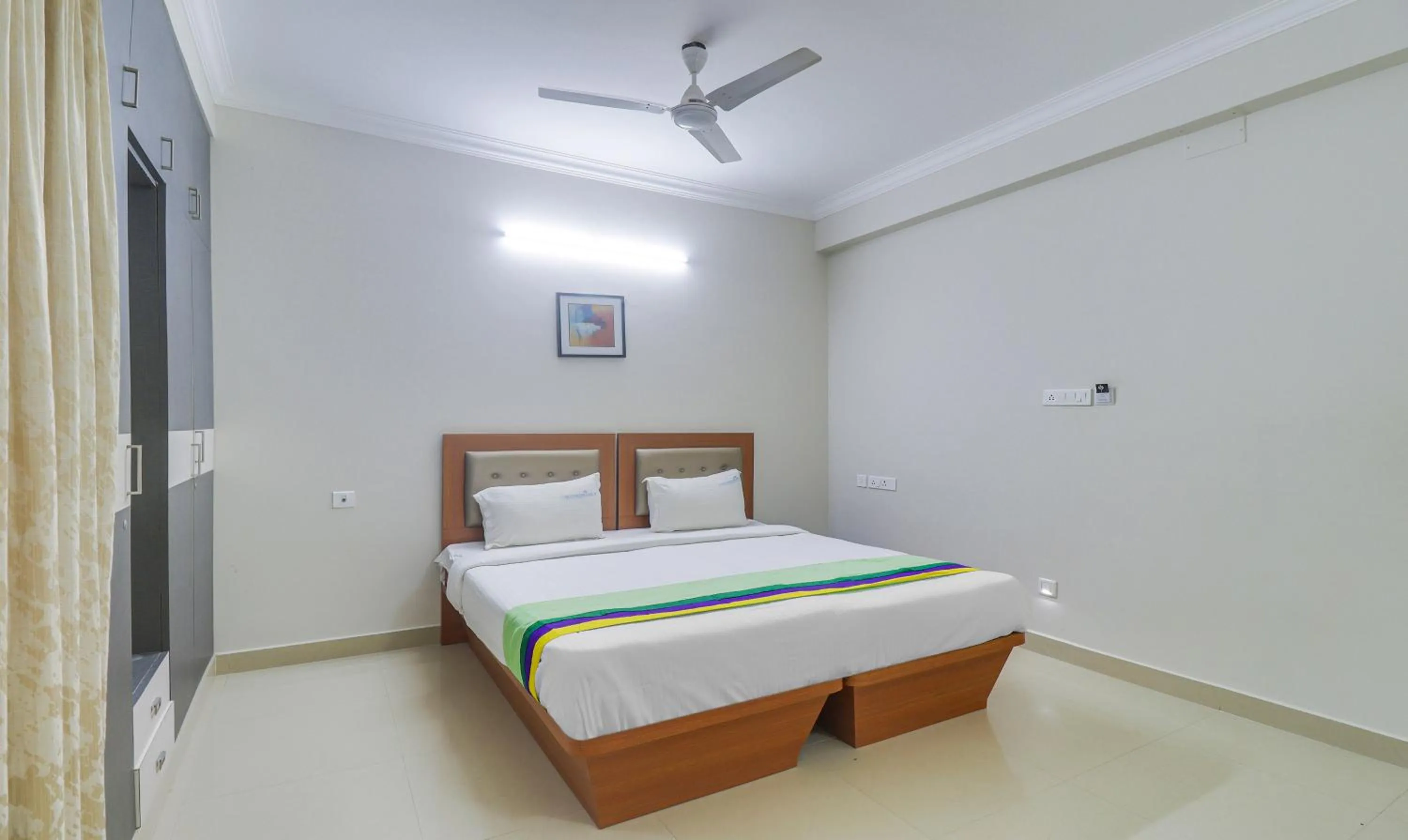 Bedroom, Bed in Treebo Rithikha Inn Elite Chennai Trade Centre