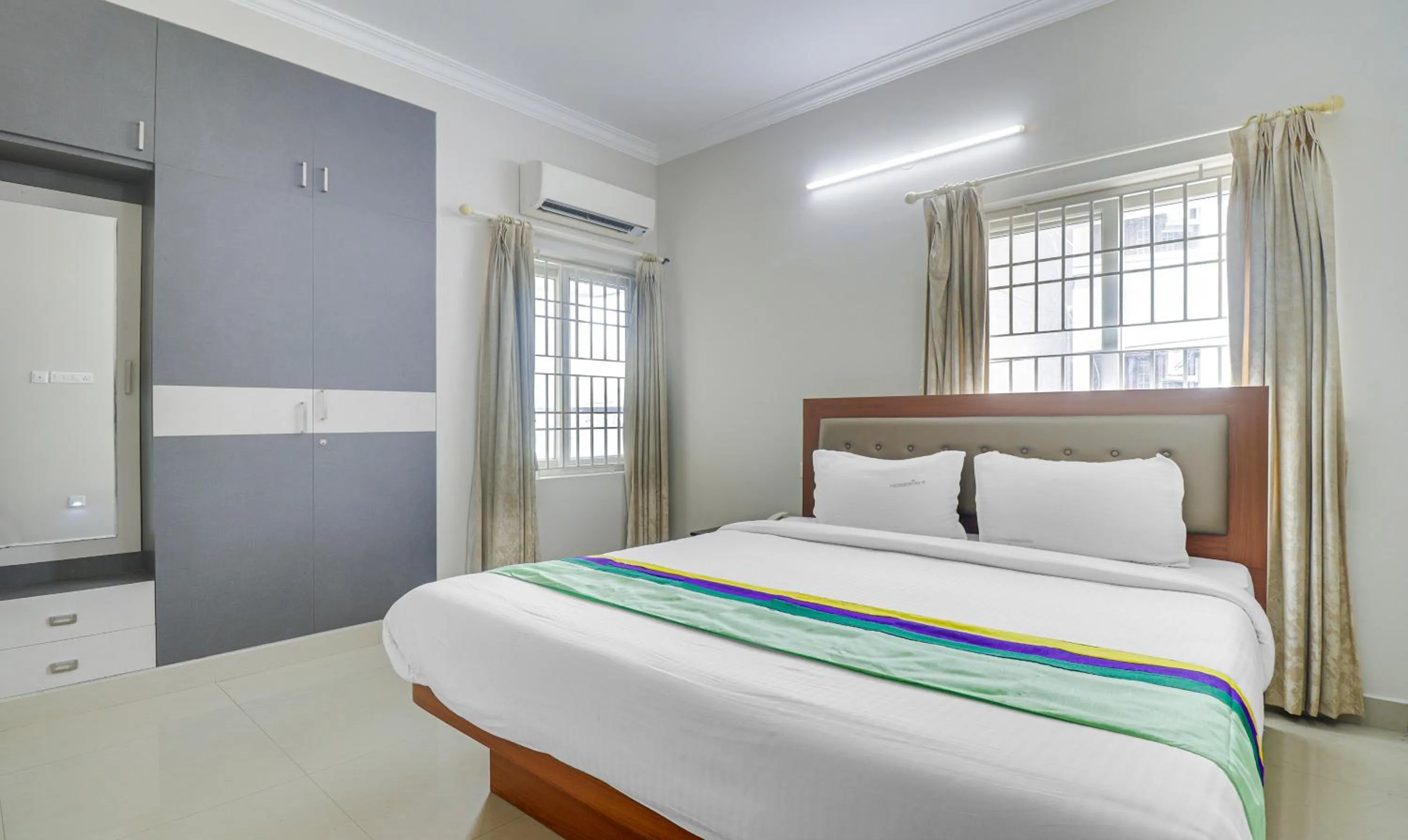 Bedroom, Bed in Treebo Rithikha Inn Elite Chennai Trade Centre