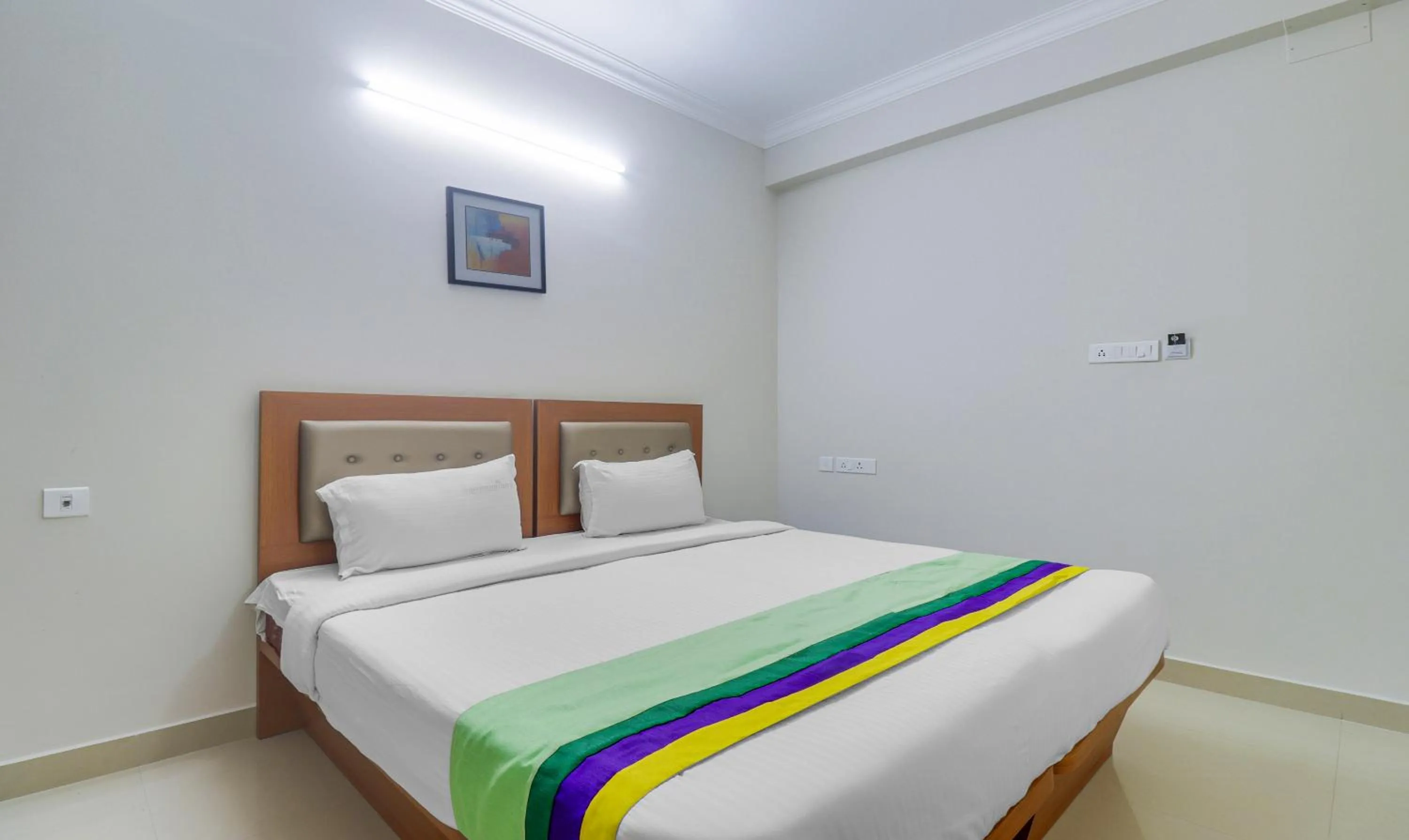 Bedroom, Bed in Treebo Rithikha Inn Elite Chennai Trade Centre