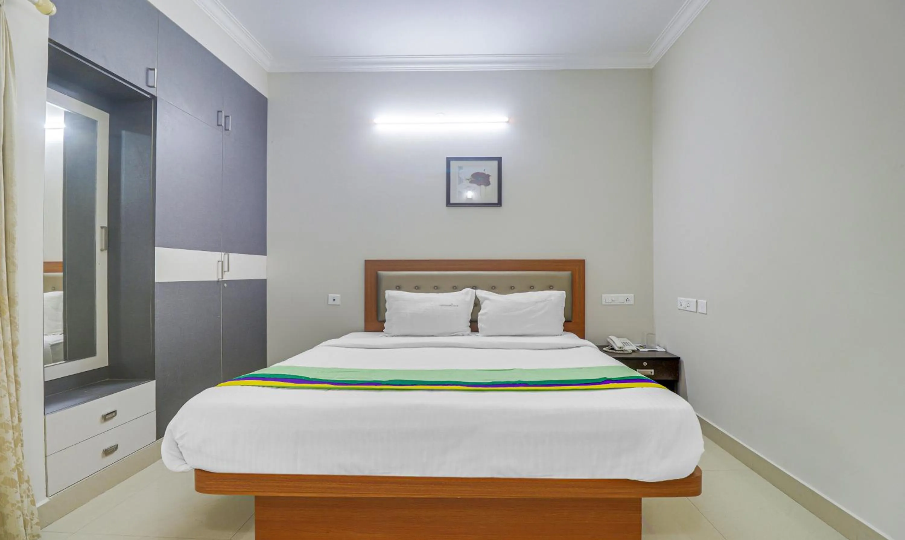 Bedroom, Bed in Treebo Rithikha Inn Elite Chennai Trade Centre