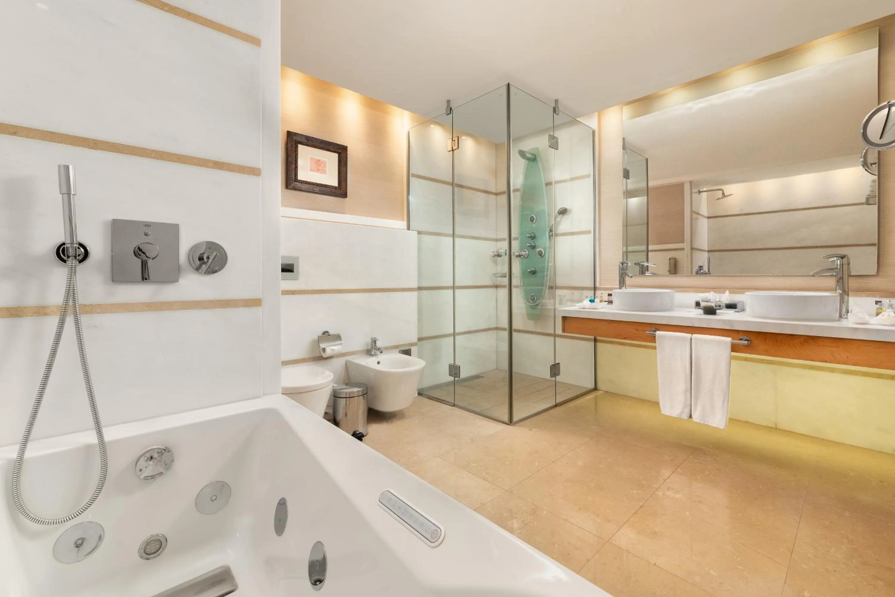 Bathroom in ABAV2 Suites by Rodos Palace