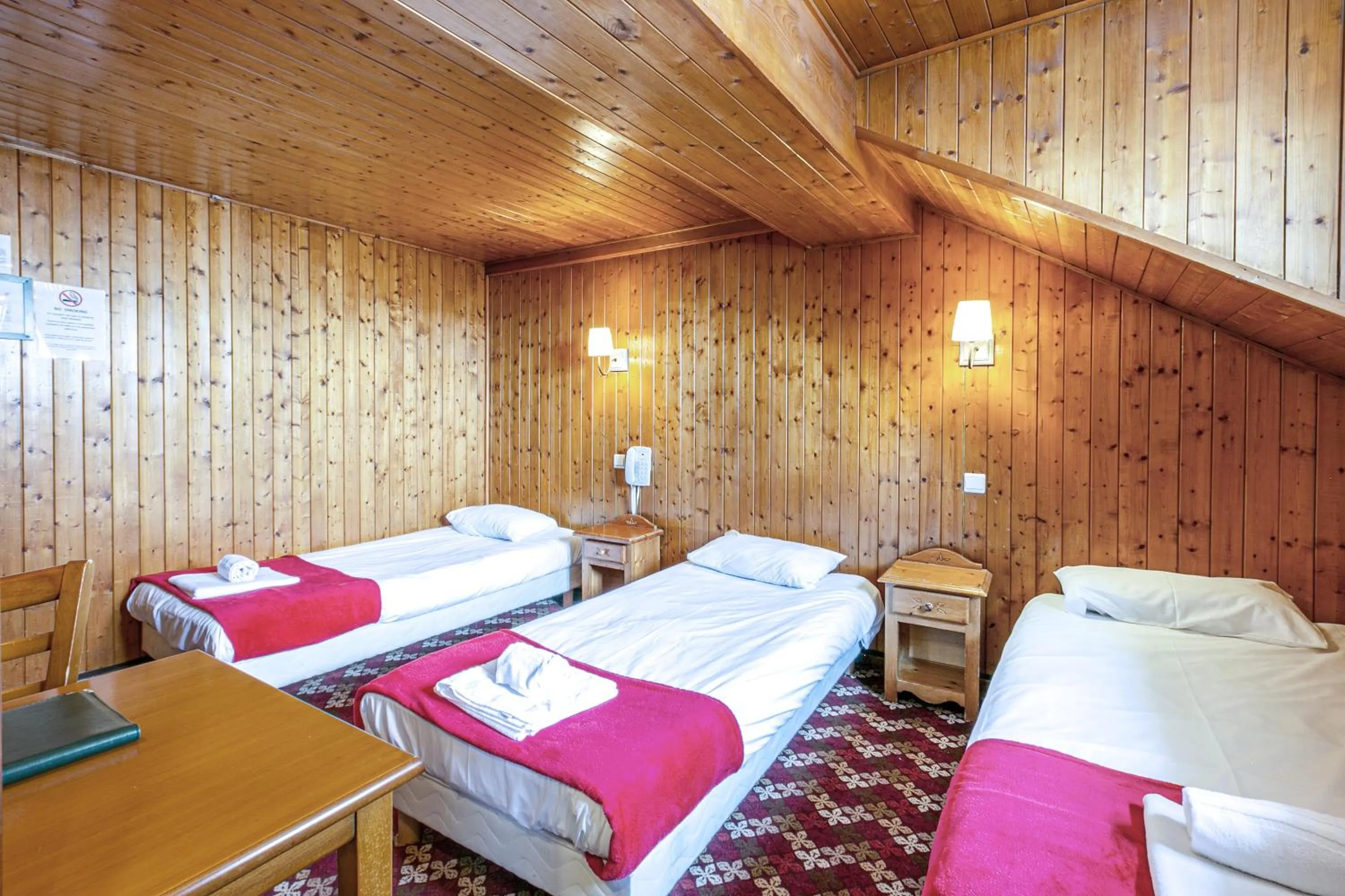 Bed in Hotel Le Chamonix