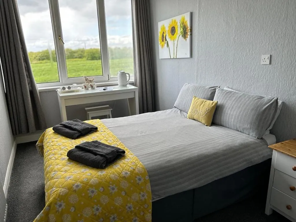 View (from property/room), Bed in The Haven Inn Limited