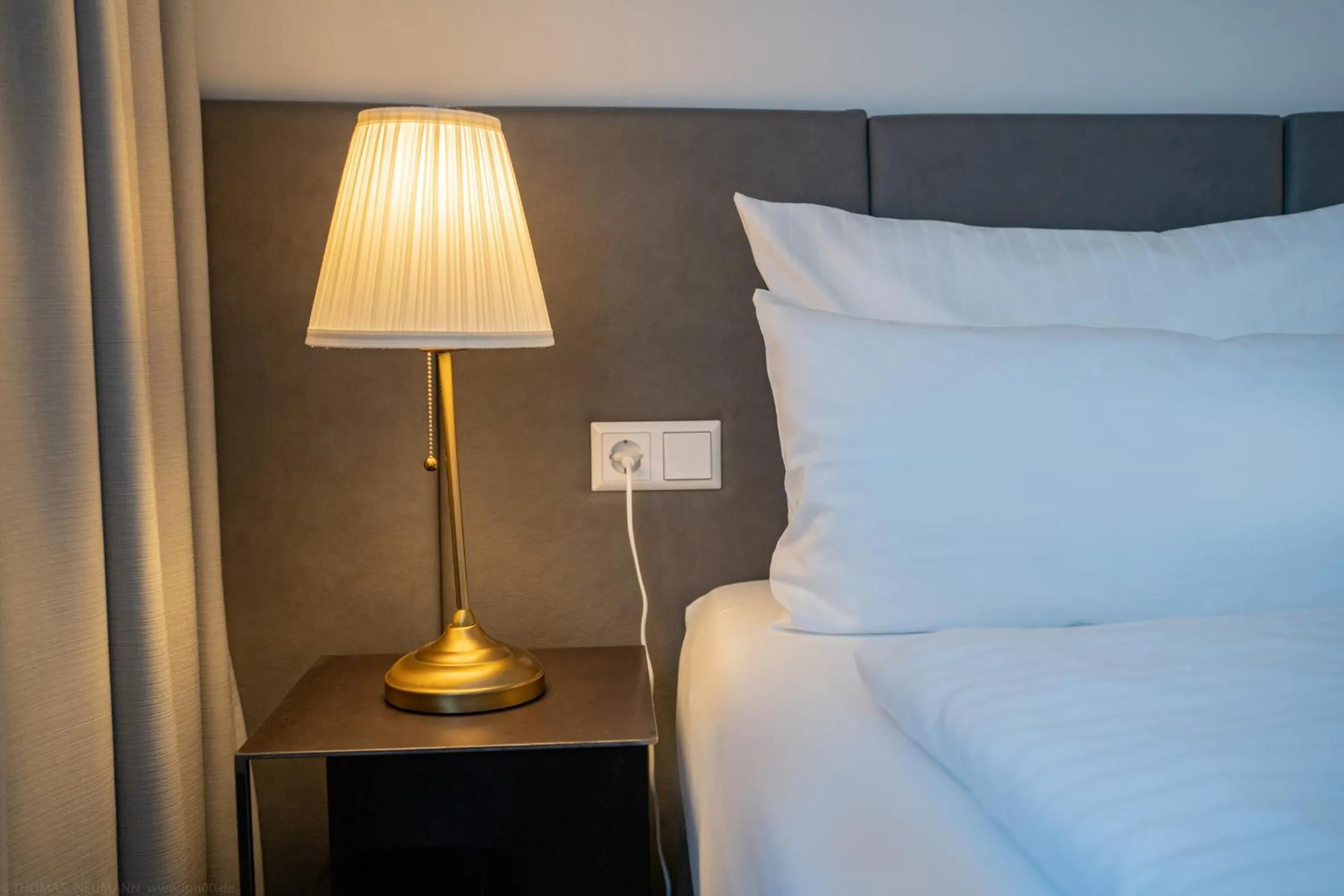 Bed in bodenseezeit Apartmenthotel Garni