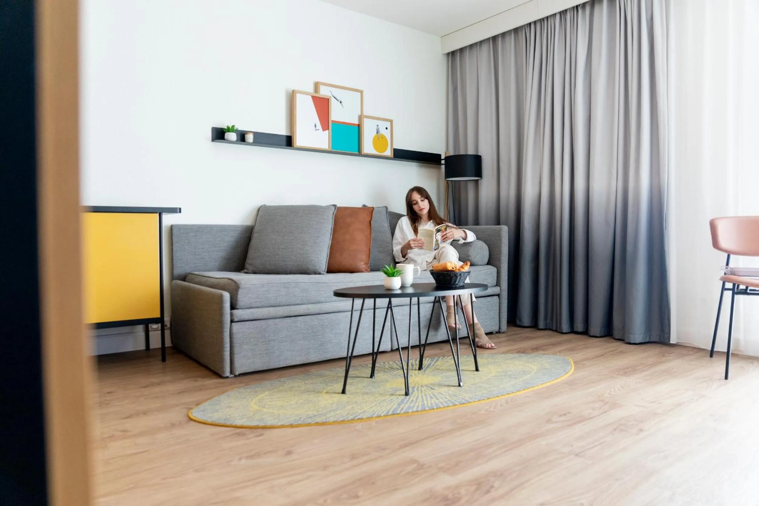 Living room in Aparthotel Adagio Annecy Centre