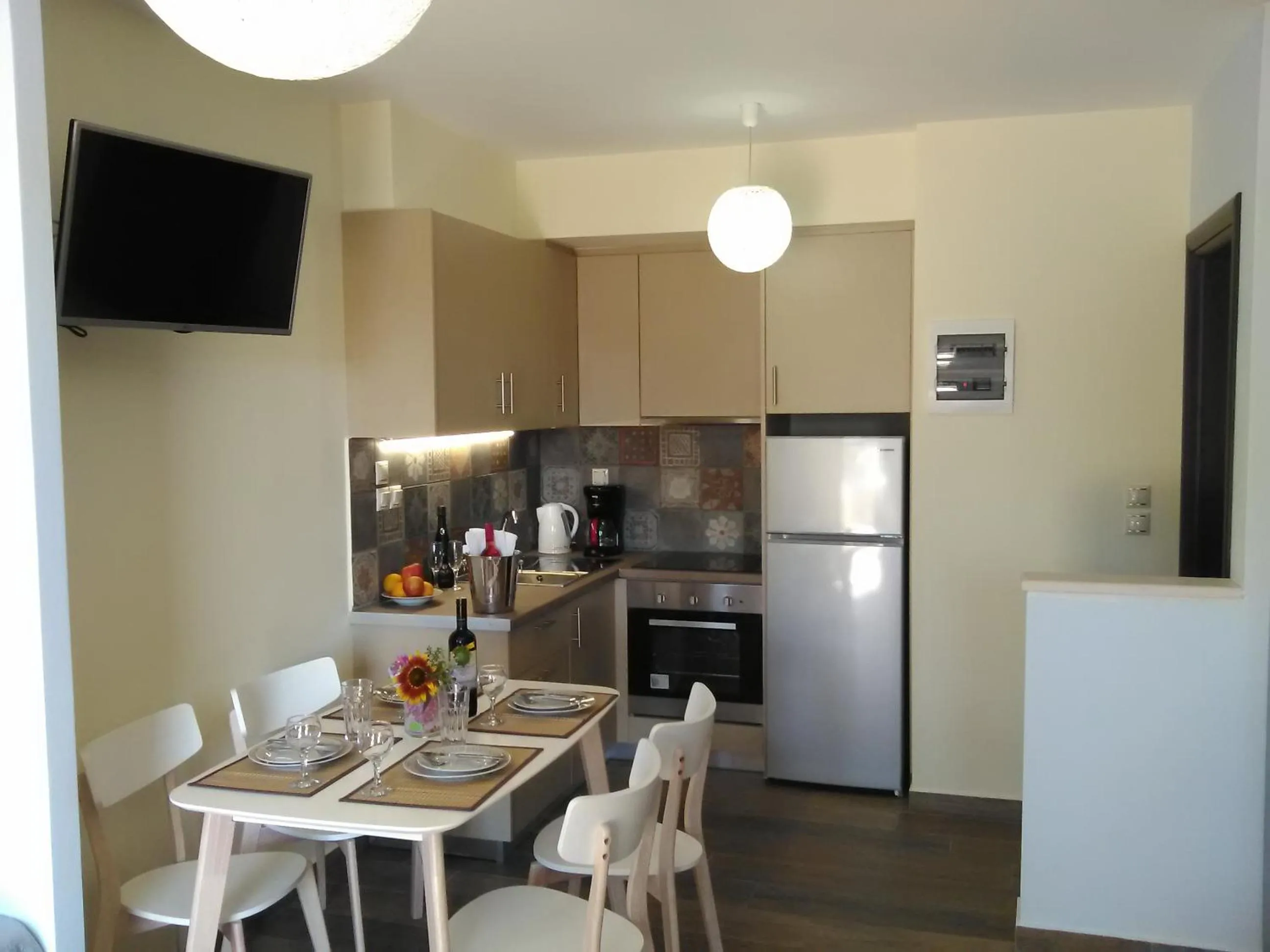 Kitchen or kitchenette in Mikros Gialos Apartments