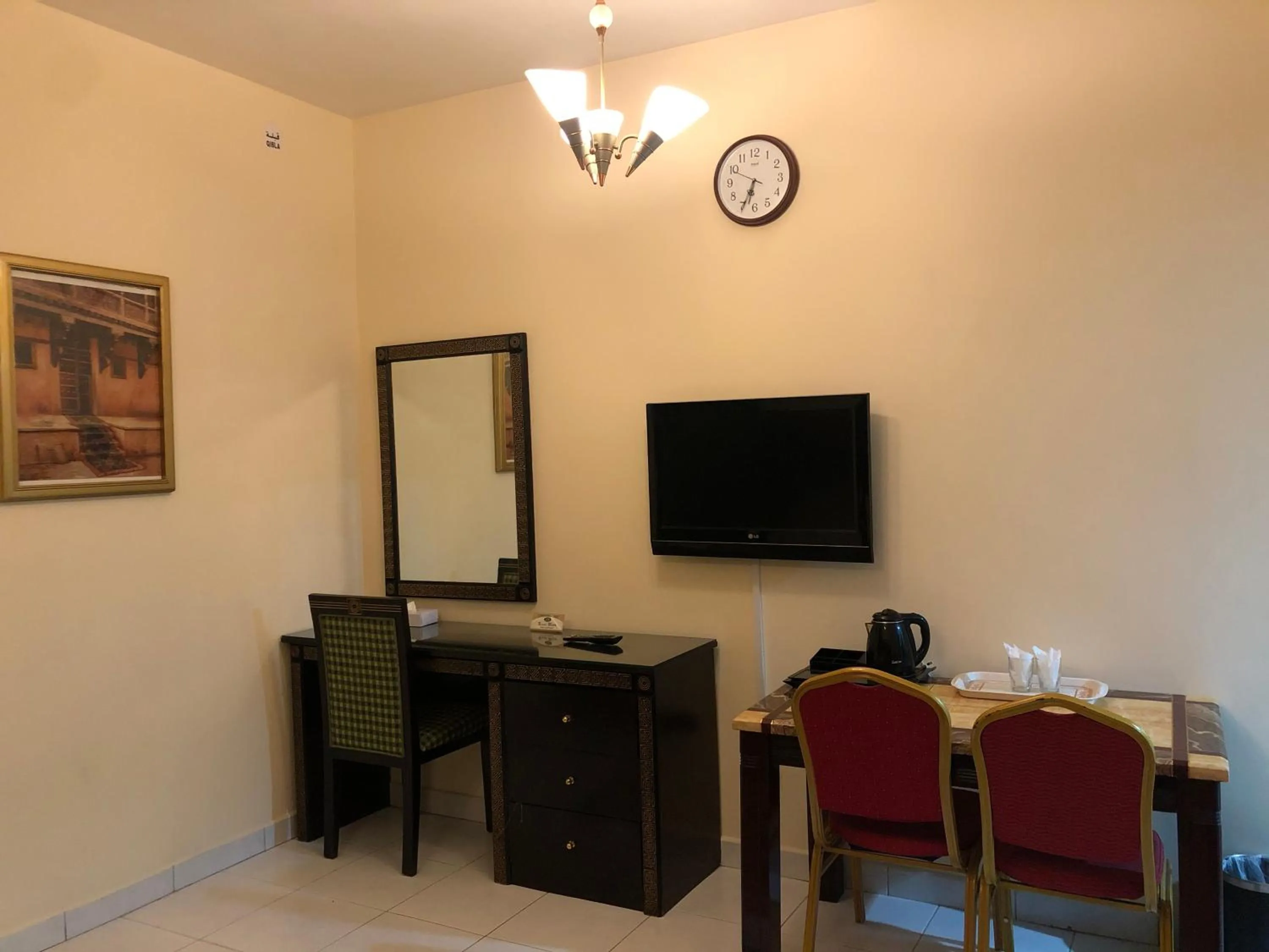 TV and multimedia in New Royal Mark Hotel Apartments