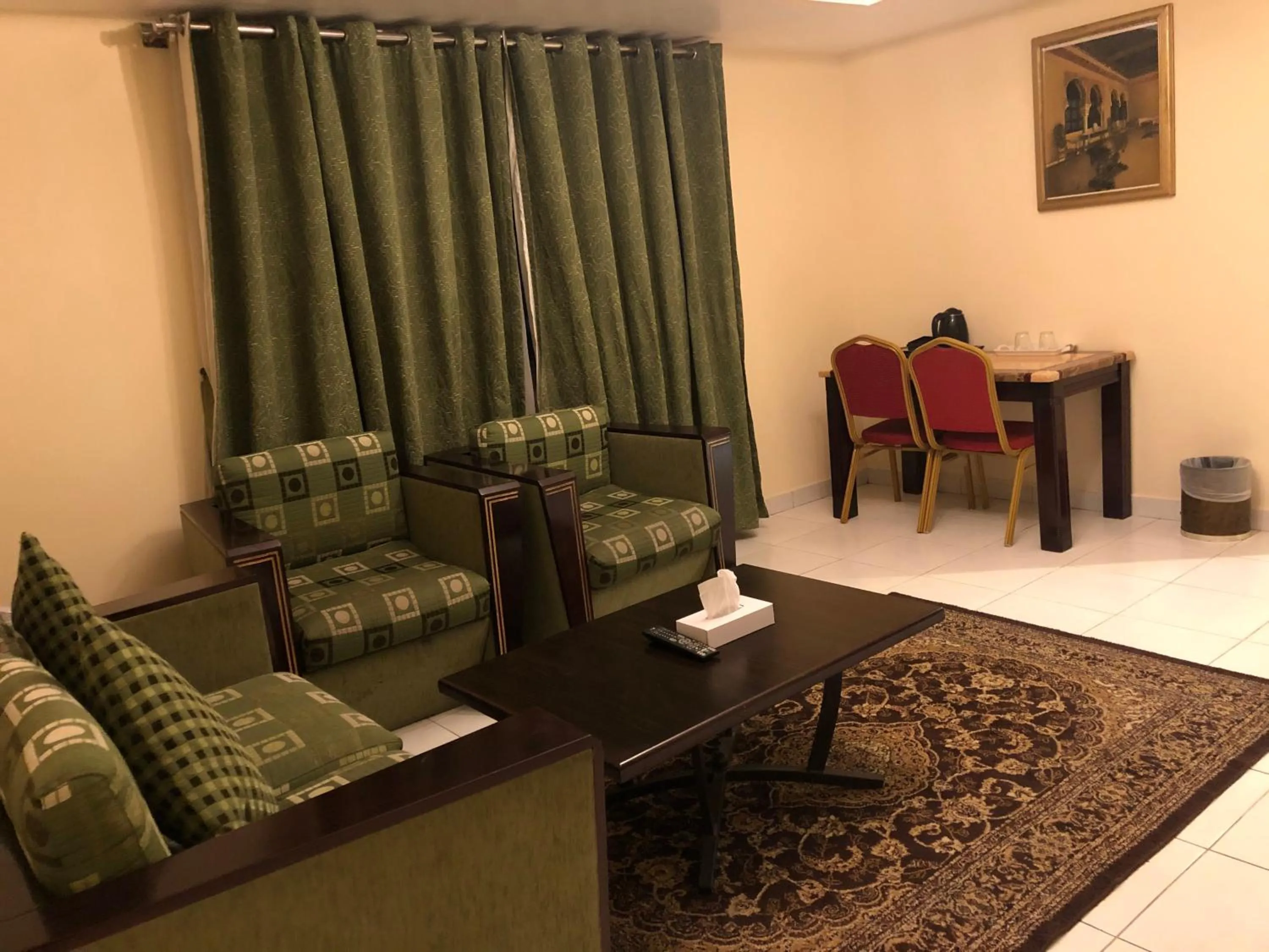 Living room in New Royal Mark Hotel Apartments