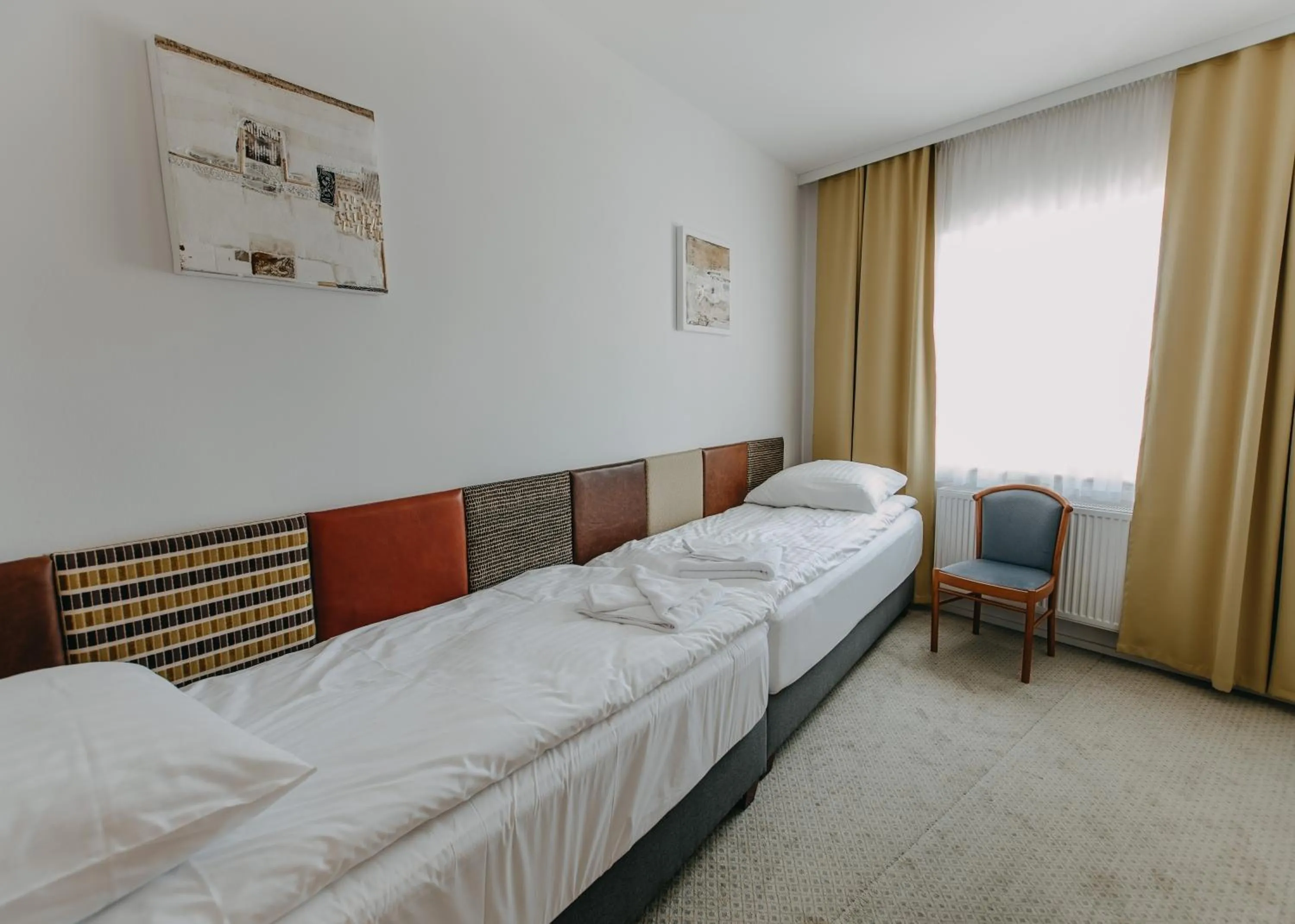 Bed in Salon Win Wine Bar & Apartments