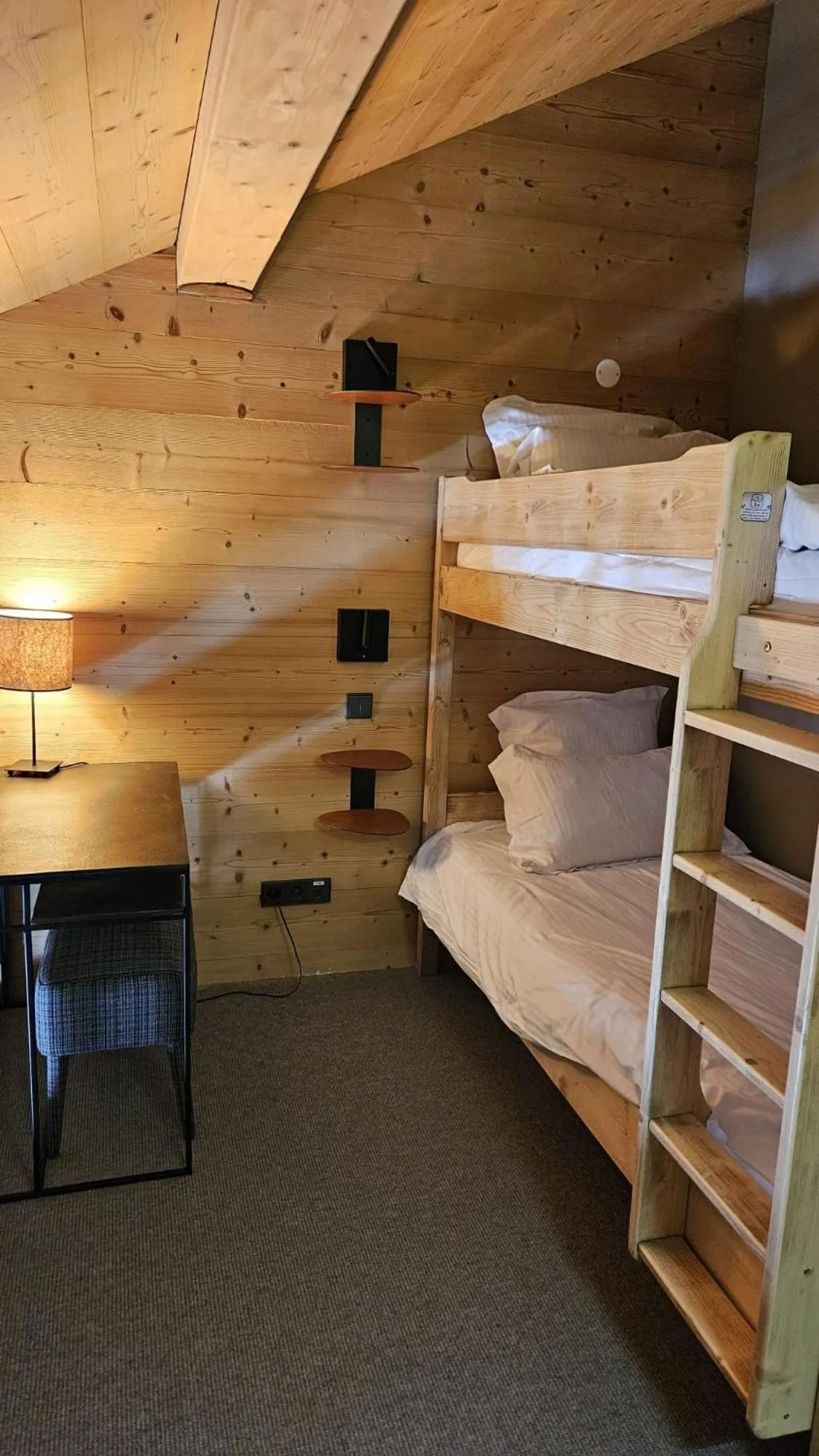 Bed in Le Chalet Blanc Hôtel & Spa