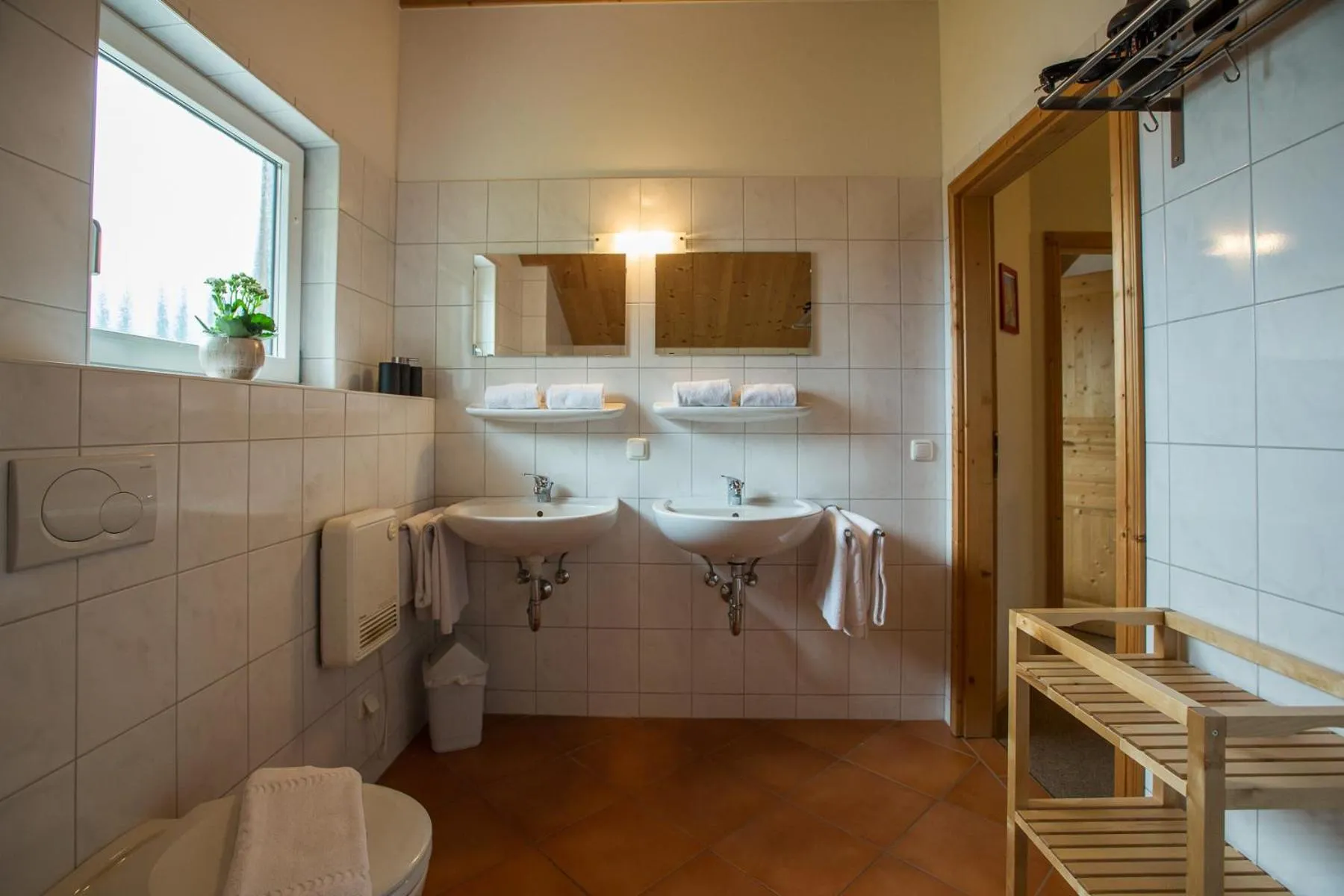 Bathroom in Alpendorf Dachstein West by ALPS RESORTS