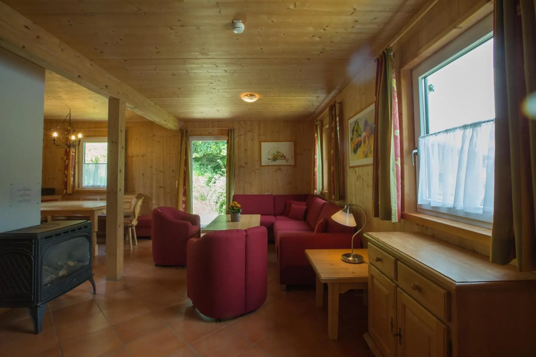 Living room in Alpendorf Dachstein West by ALPS RESORTS