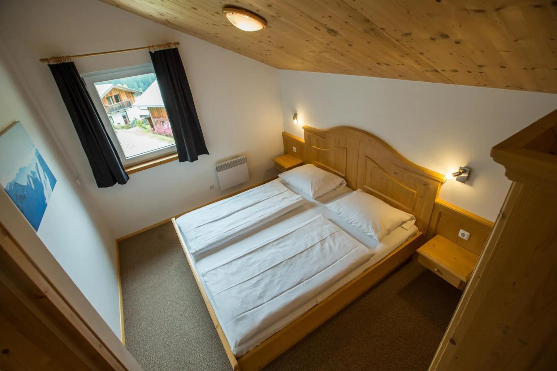 Bedroom, Bed in Alpendorf Dachstein West by ALPS RESORTS