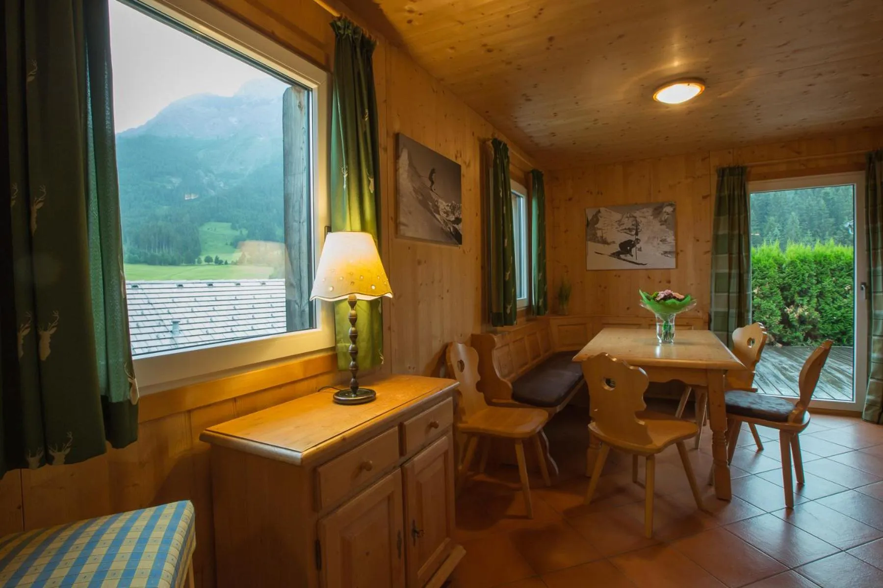 Dining area in Alpendorf Dachstein West by ALPS RESORTS