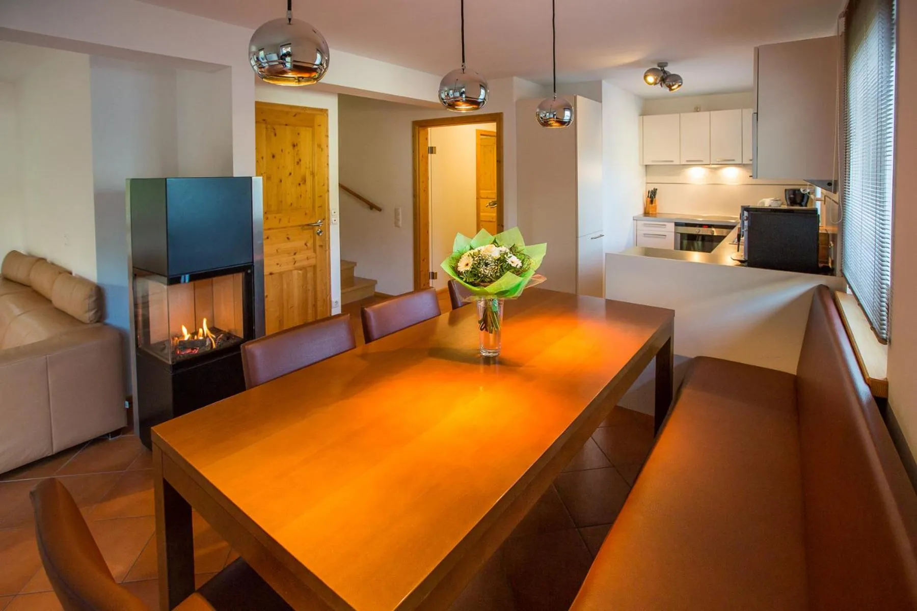 Dining area in Alpendorf Dachstein West by ALPS RESORTS