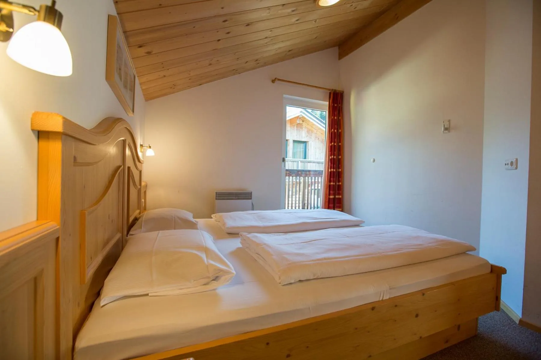 Bedroom, Bed in Alpendorf Dachstein West by ALPS RESORTS