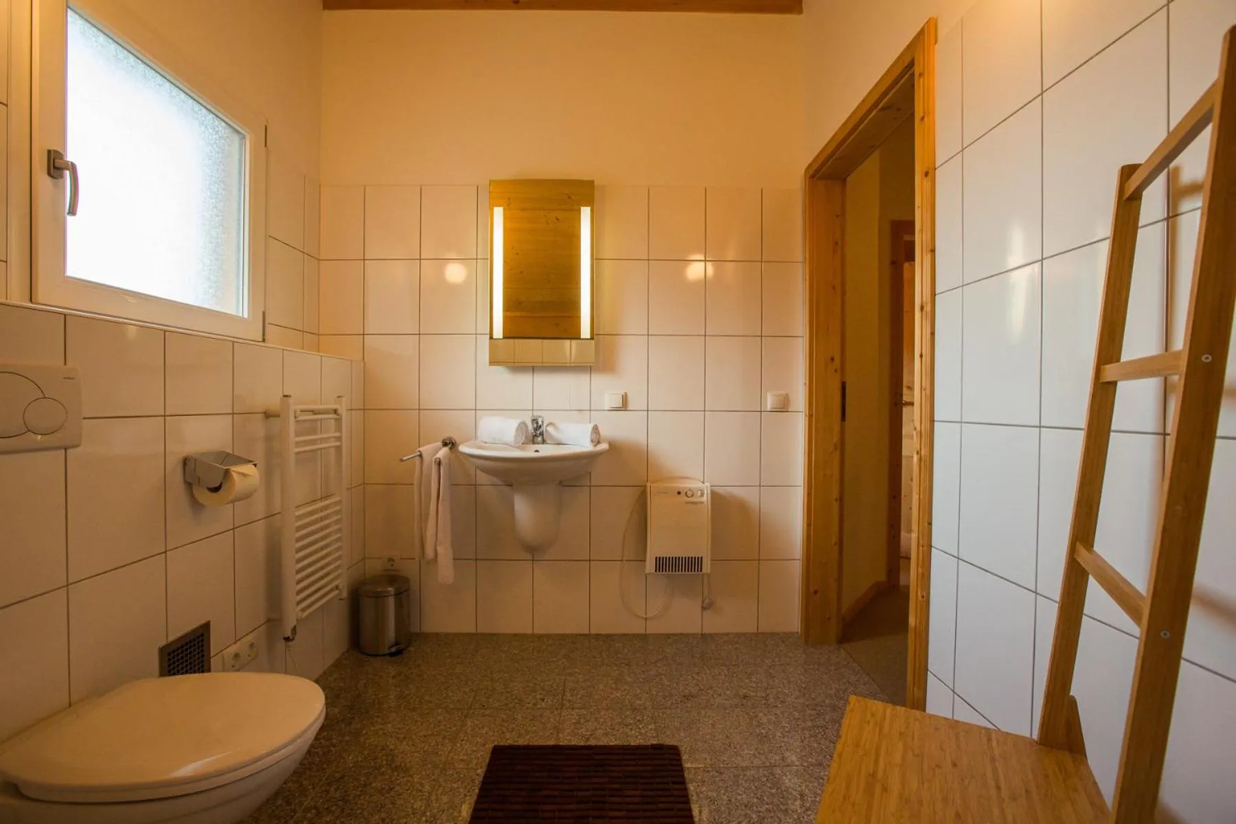 Bathroom in Alpendorf Dachstein West by ALPS RESORTS