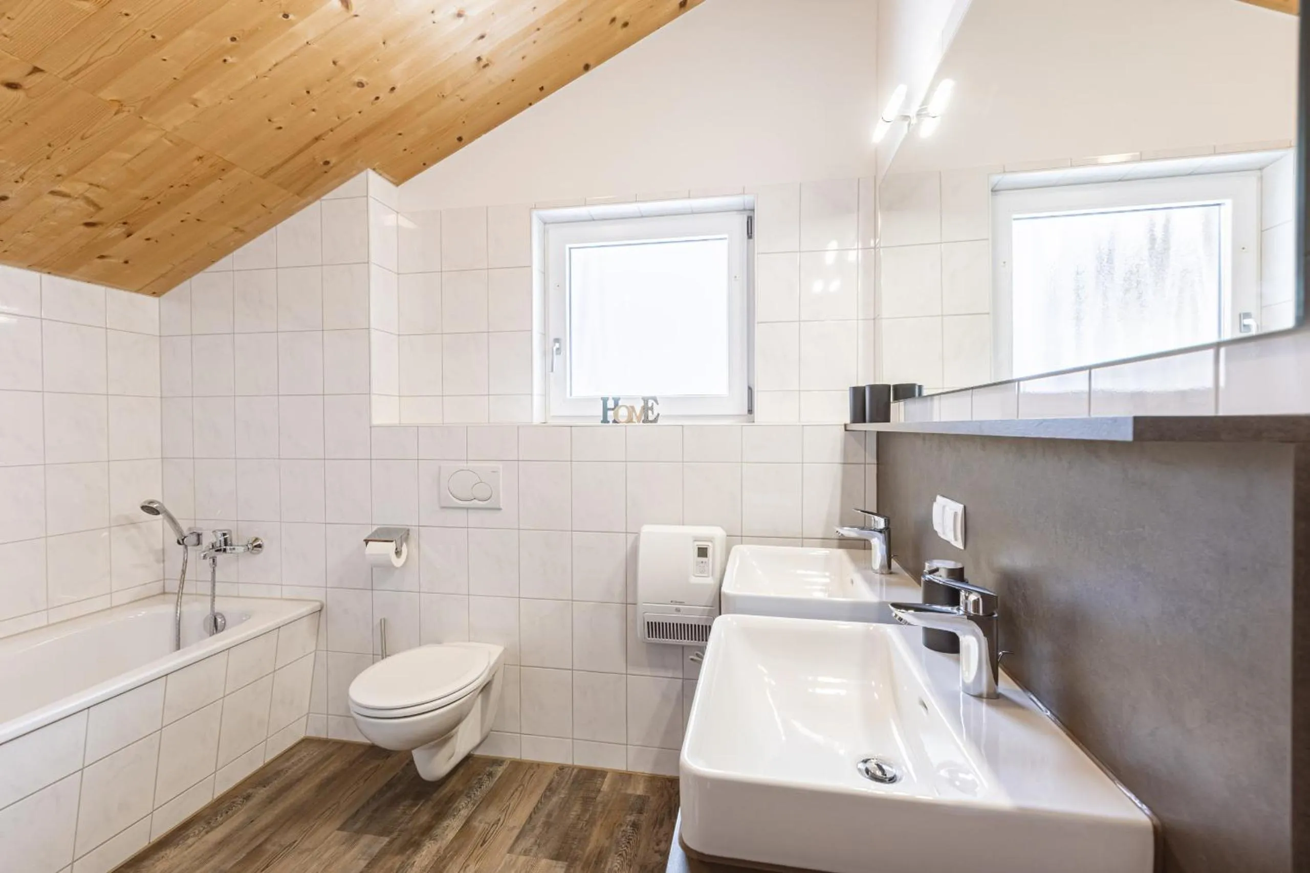 Bathroom in Alpendorf Dachstein West by ALPS RESORTS