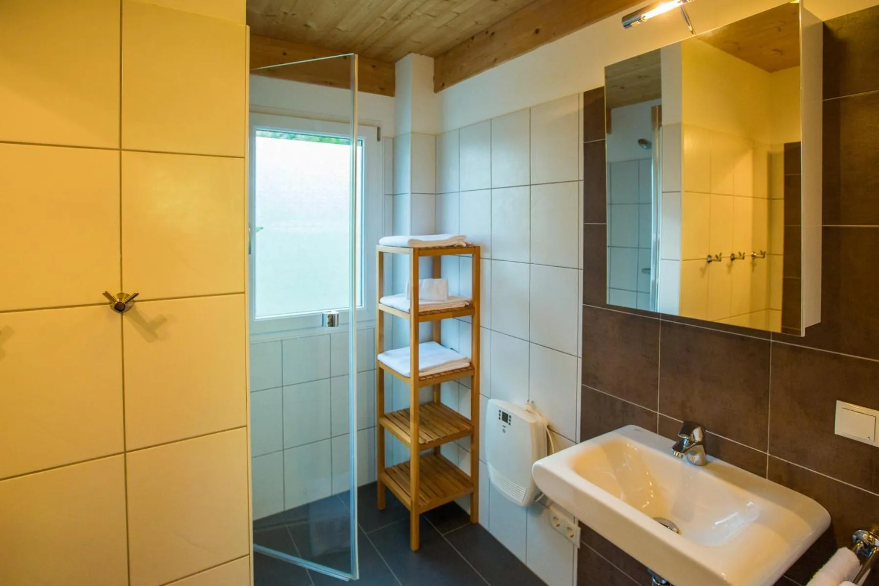 Bathroom in Alpendorf Dachstein West by ALPS RESORTS
