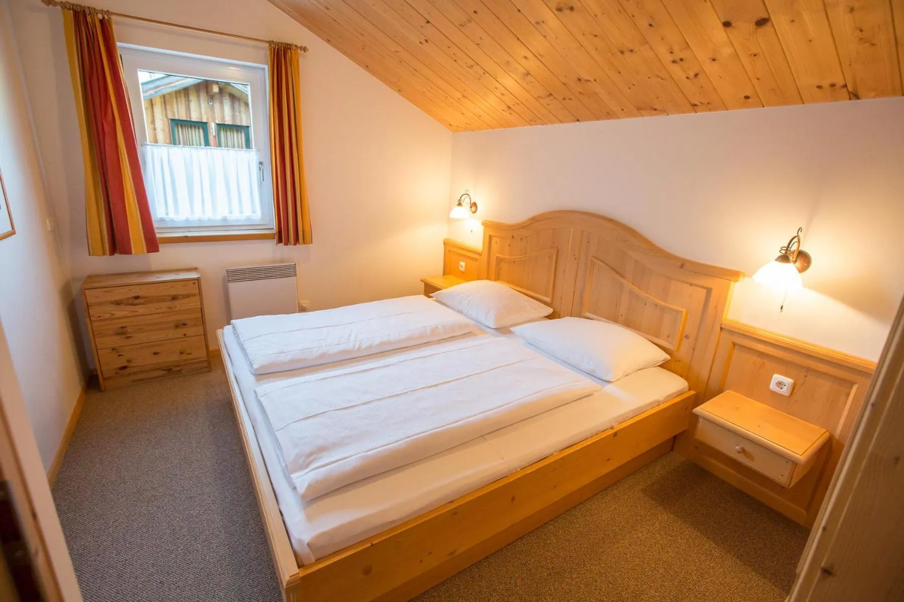 Bedroom, Bed in Alpendorf Dachstein West by ALPS RESORTS