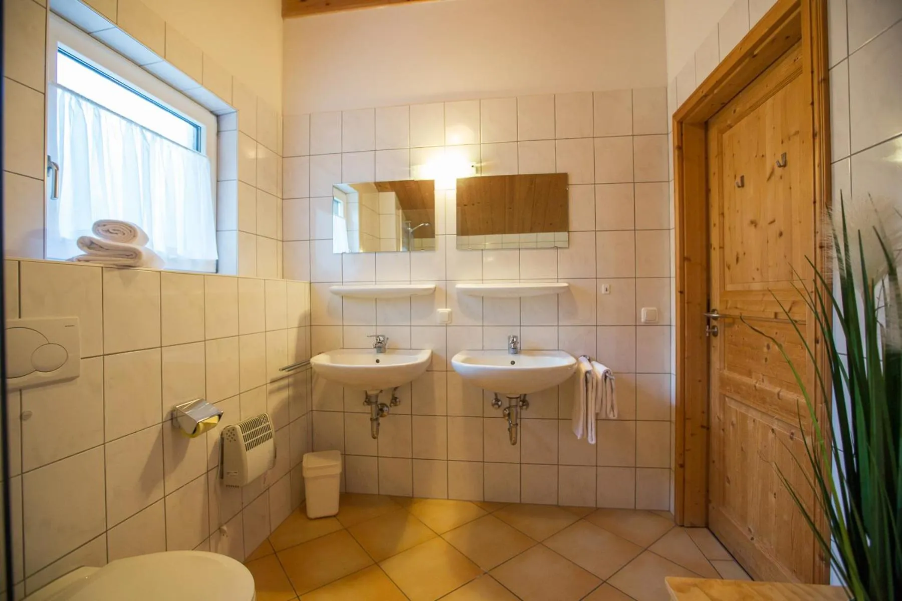 Bathroom in Alpendorf Dachstein West by ALPS RESORTS