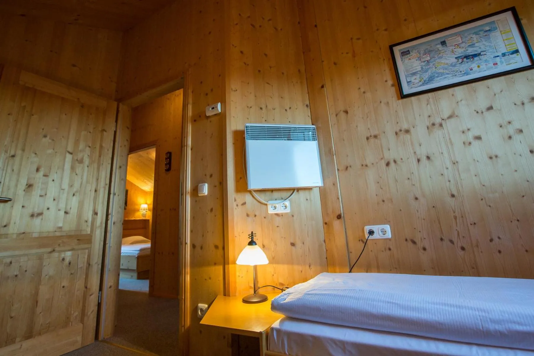 Bedroom, Bed in Alpendorf Dachstein West by ALPS RESORTS