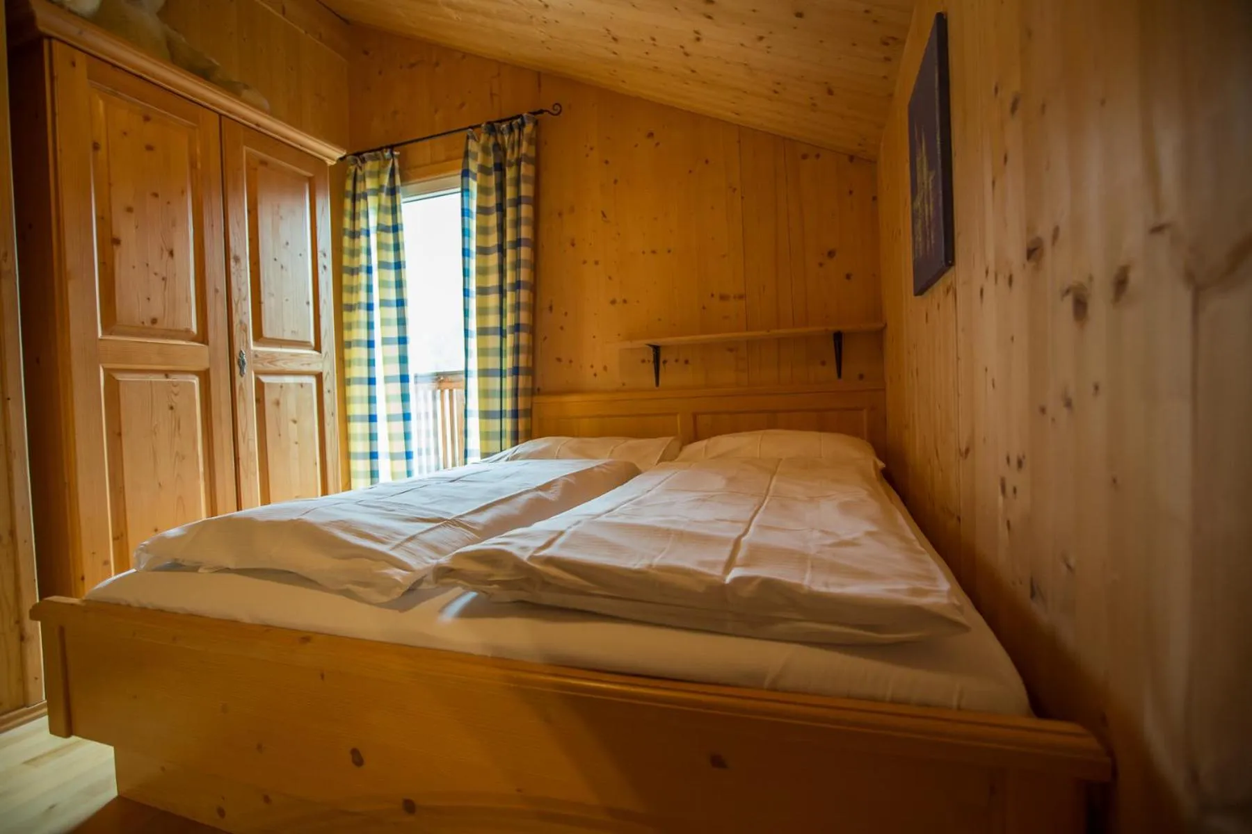 Bedroom, Bed in Alpendorf Dachstein West by ALPS RESORTS