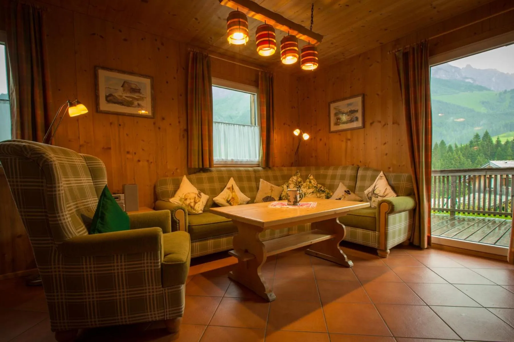 Living room in Alpendorf Dachstein West by ALPS RESORTS