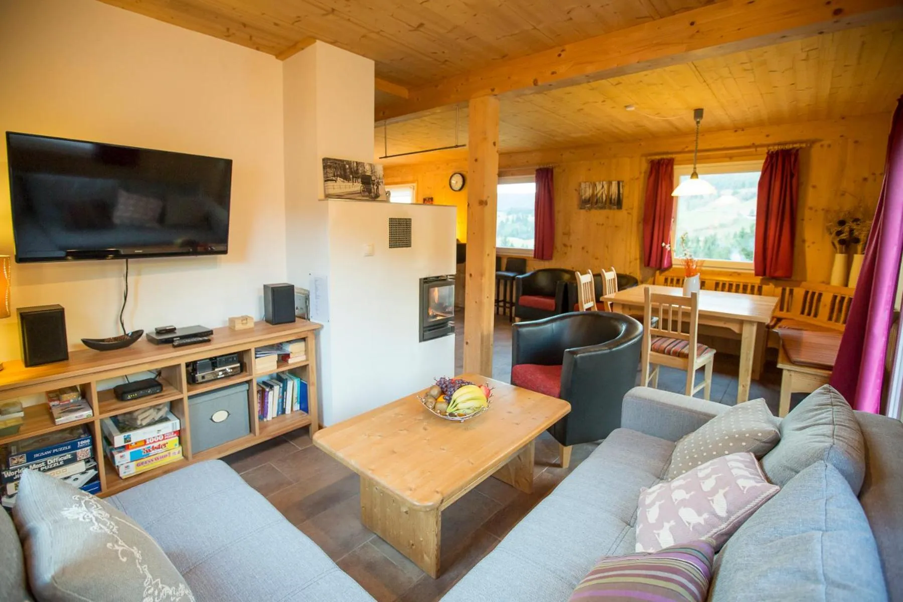 Living room in Alpendorf Dachstein West by ALPS RESORTS