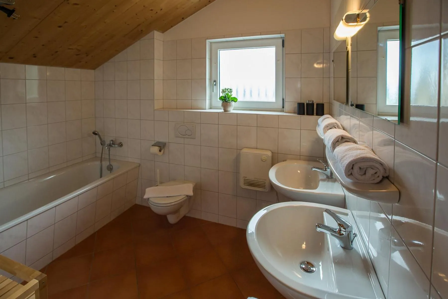 Bathroom in Alpendorf Dachstein West by ALPS RESORTS