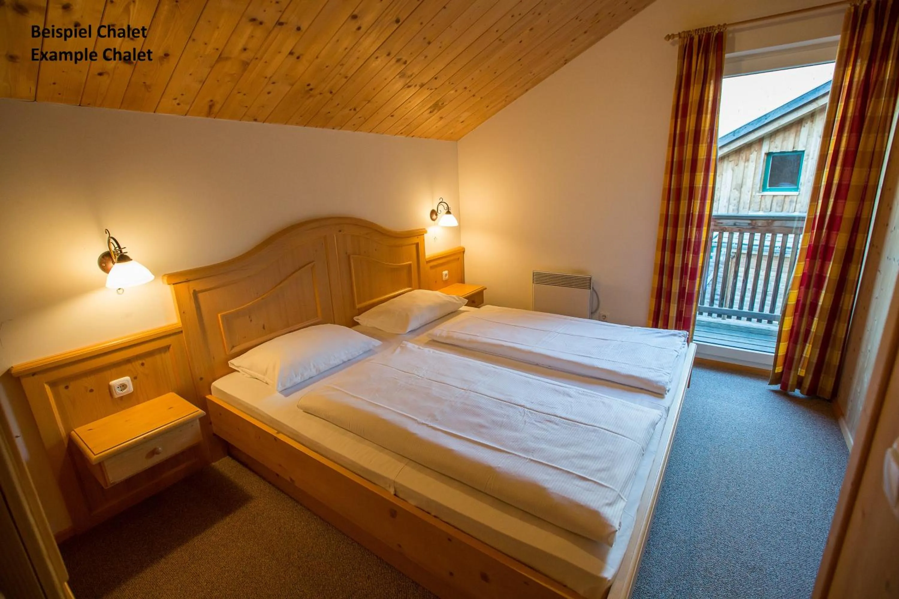 Bedroom, Bed in Alpendorf Dachstein West by ALPS RESORTS