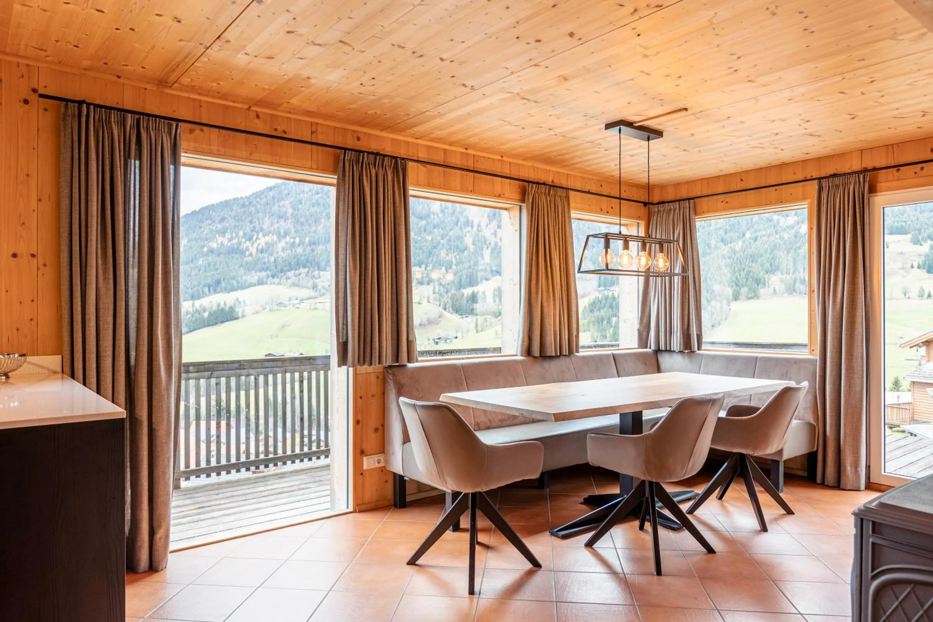 Dining area in Alpendorf Dachstein West by ALPS RESORTS
