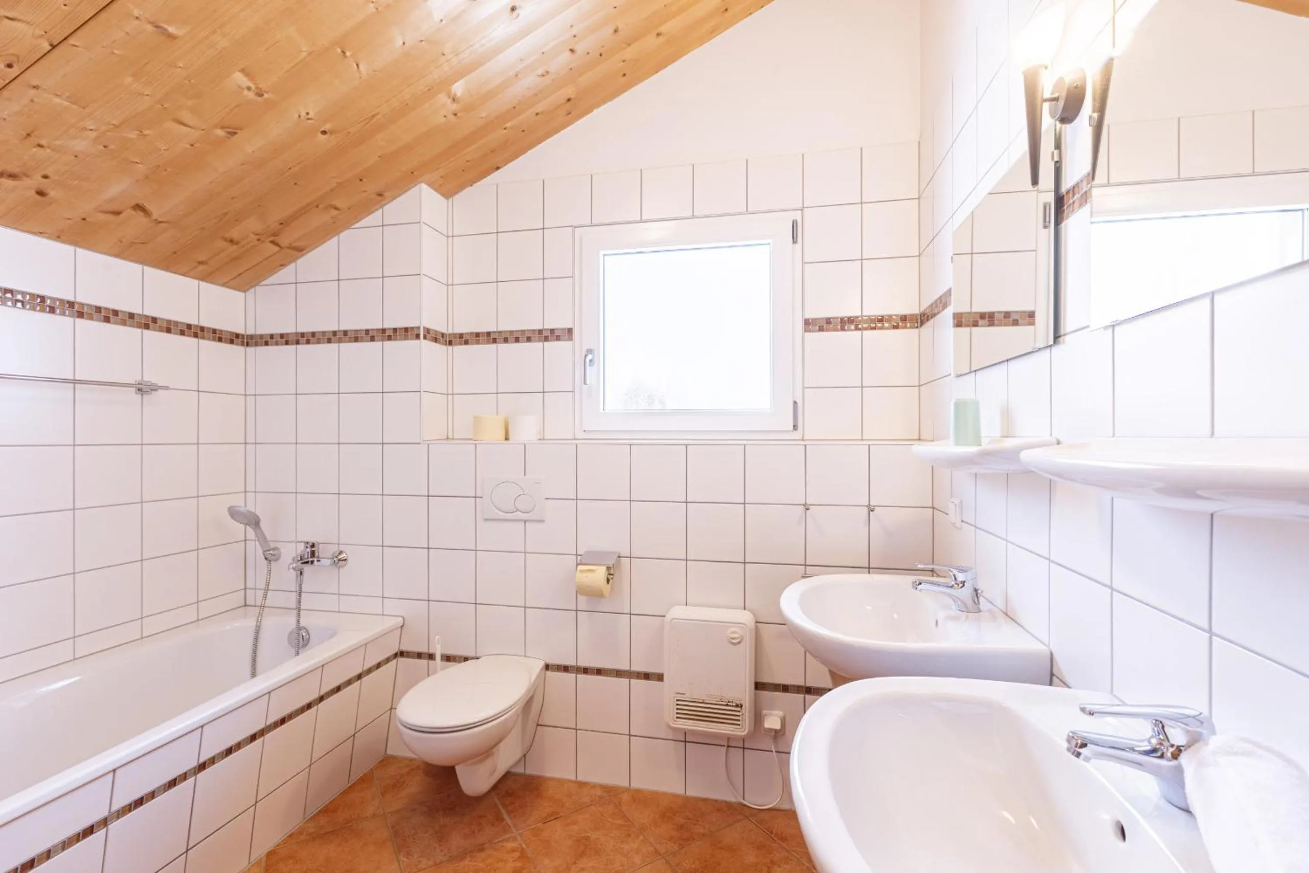 Bathroom in Alpendorf Dachstein West by ALPS RESORTS