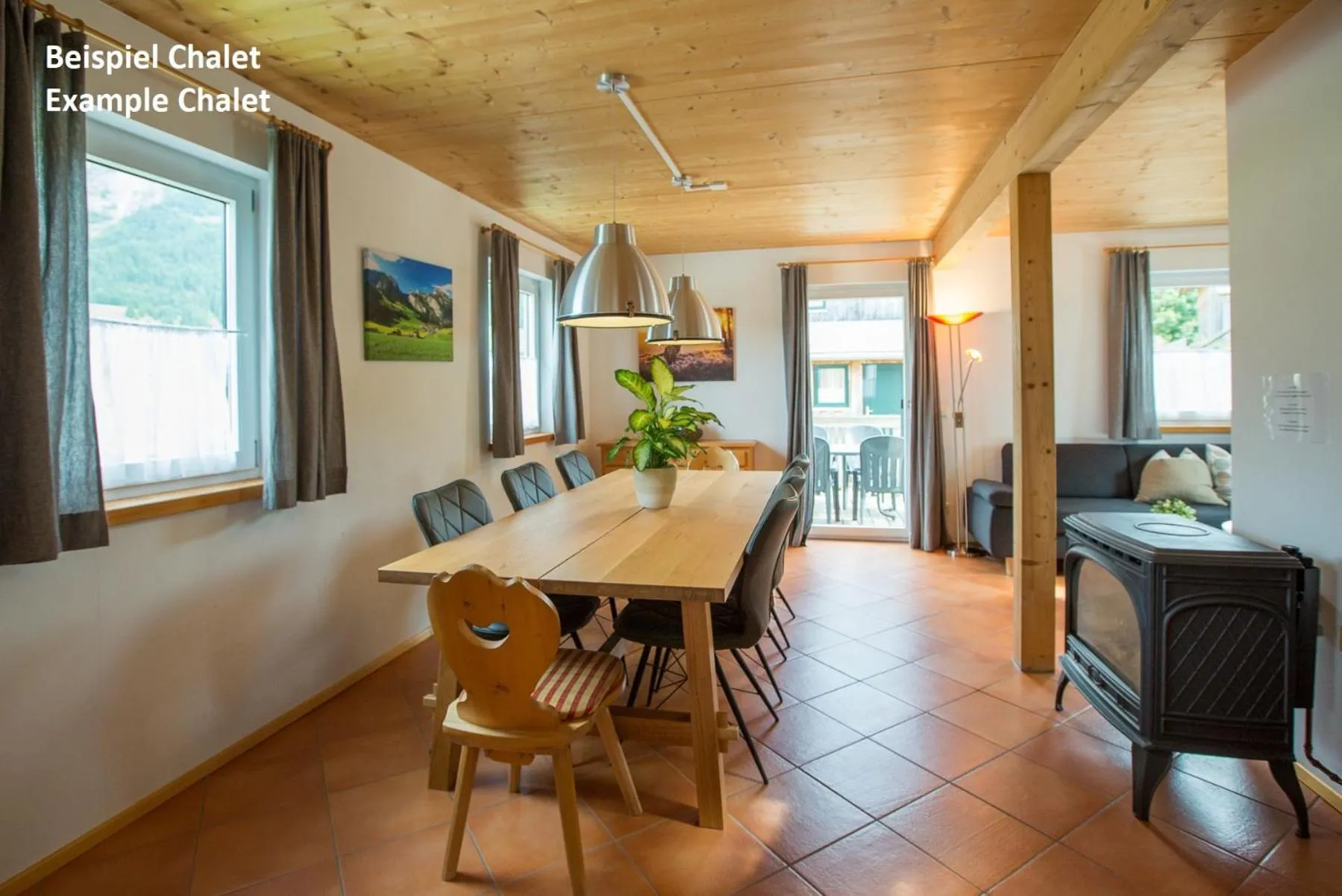 Dining area in Alpendorf Dachstein West by ALPS RESORTS