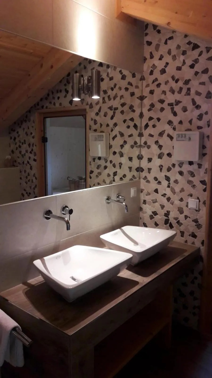 Bathroom in Alpendorf Dachstein West by ALPS RESORTS