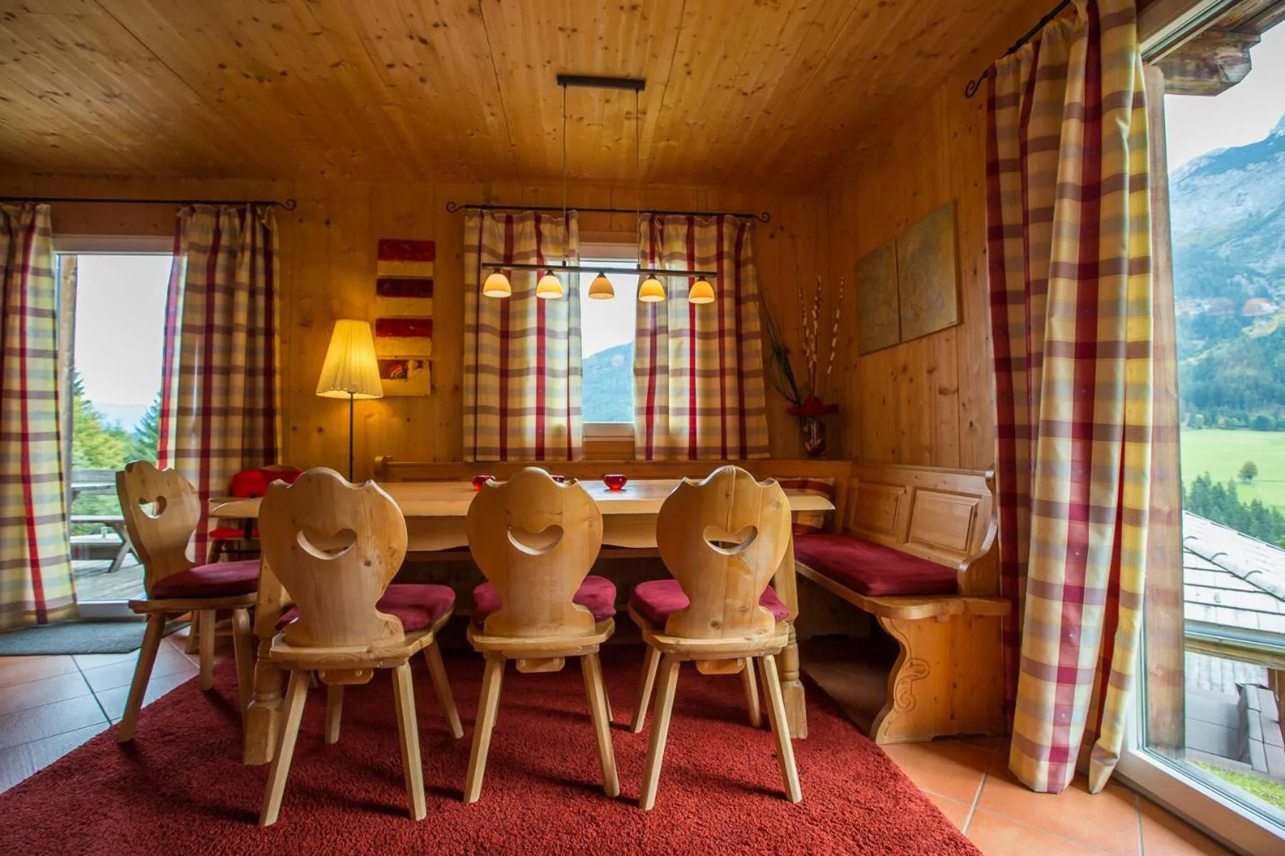 Dining area in Alpendorf Dachstein West by ALPS RESORTS