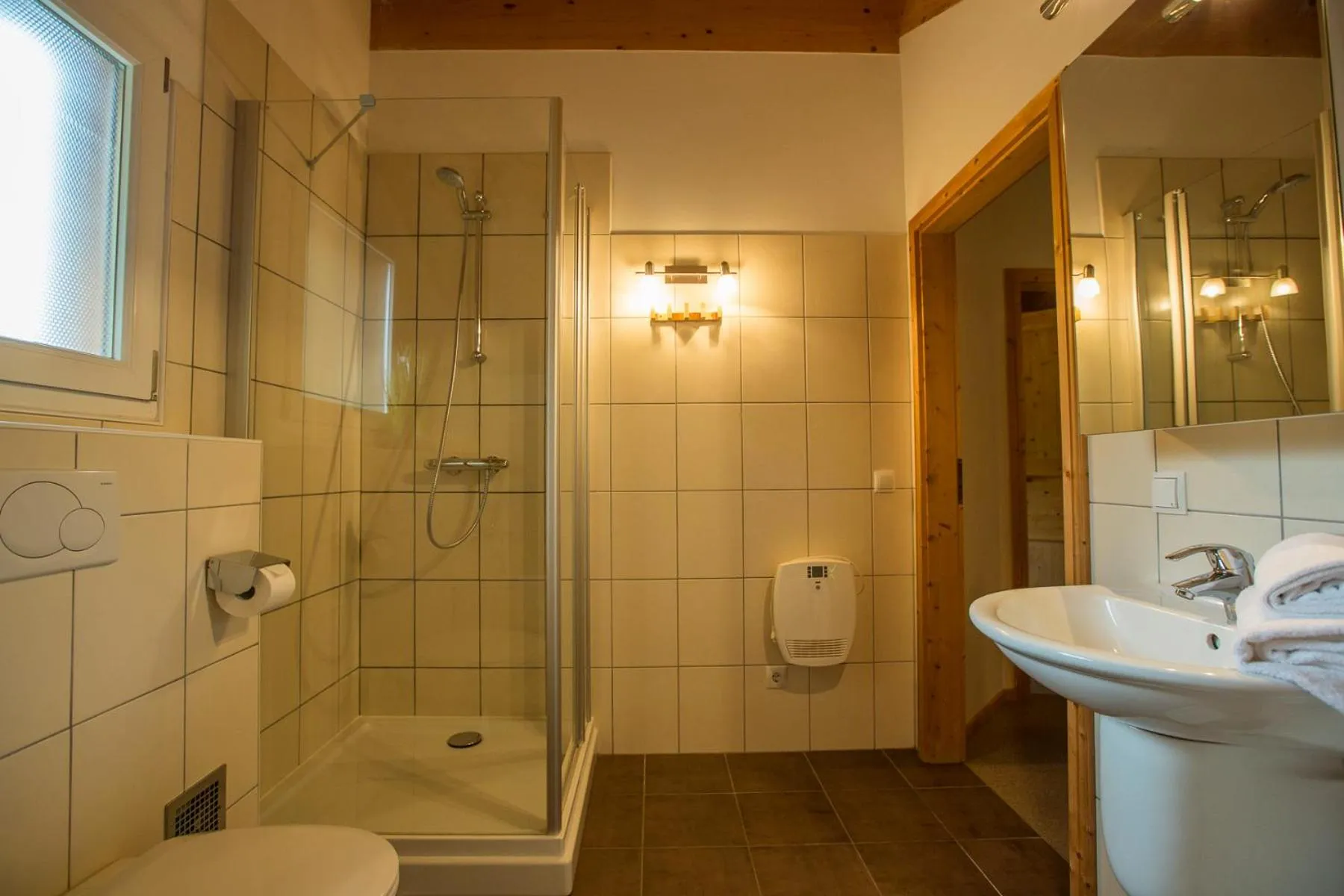 Bathroom in Alpendorf Dachstein West by ALPS RESORTS