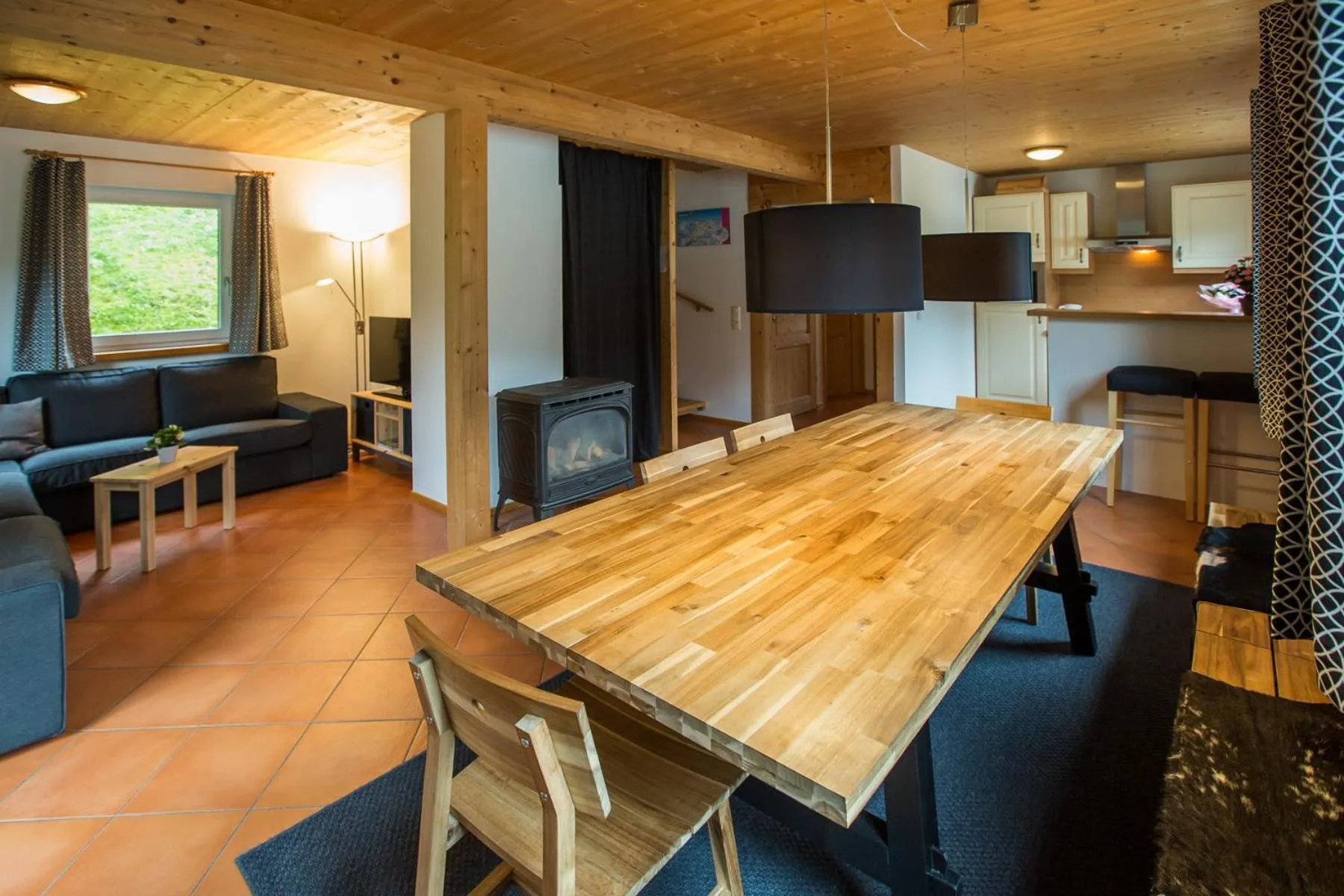 Dining area in Alpendorf Dachstein West by ALPS RESORTS